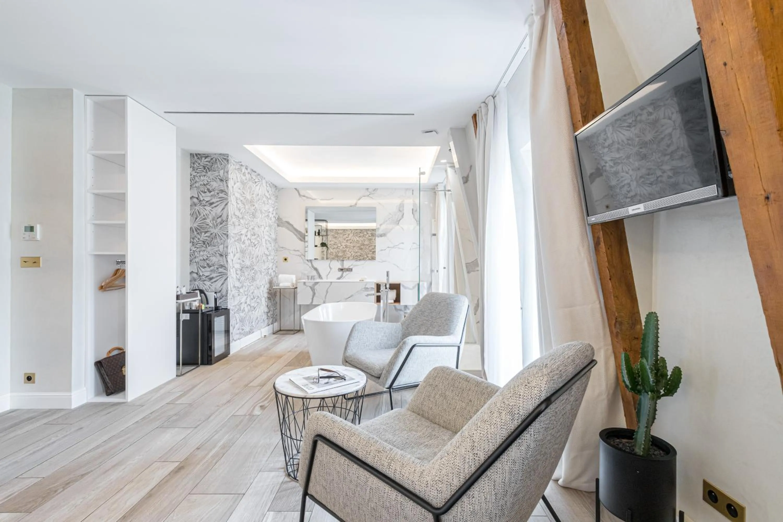 Seating area in Le Dortoir Boutique Suites