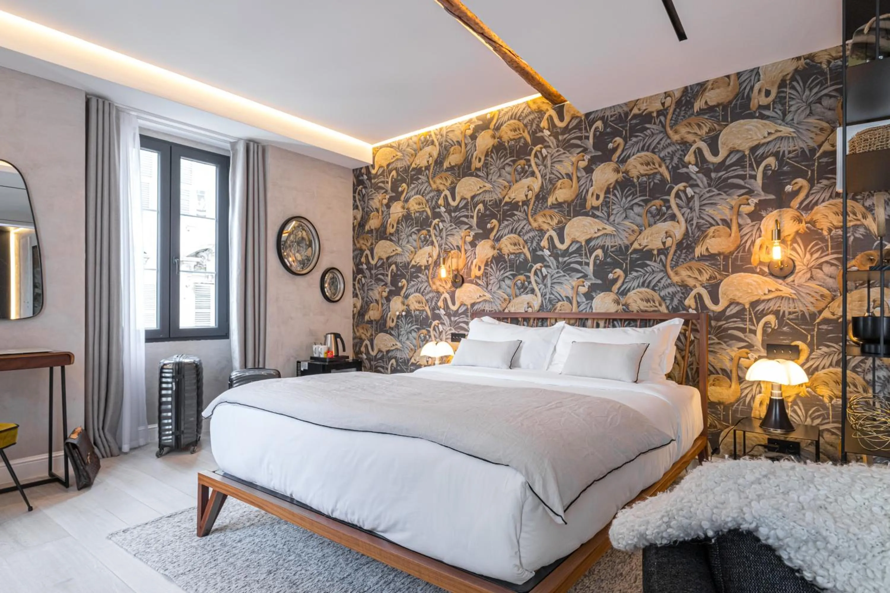 Bed in Le Dortoir Boutique Suites
