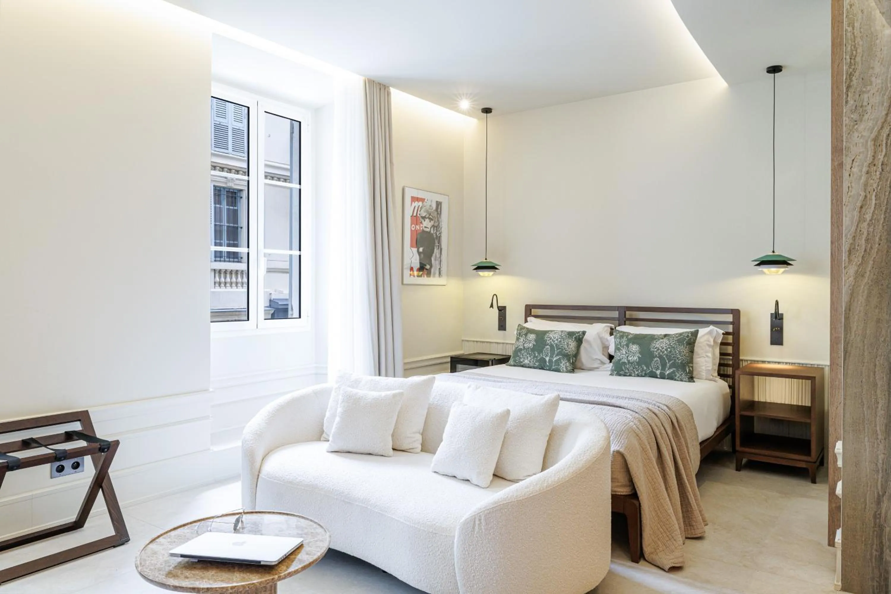 Bed in Le Dortoir Boutique Suites