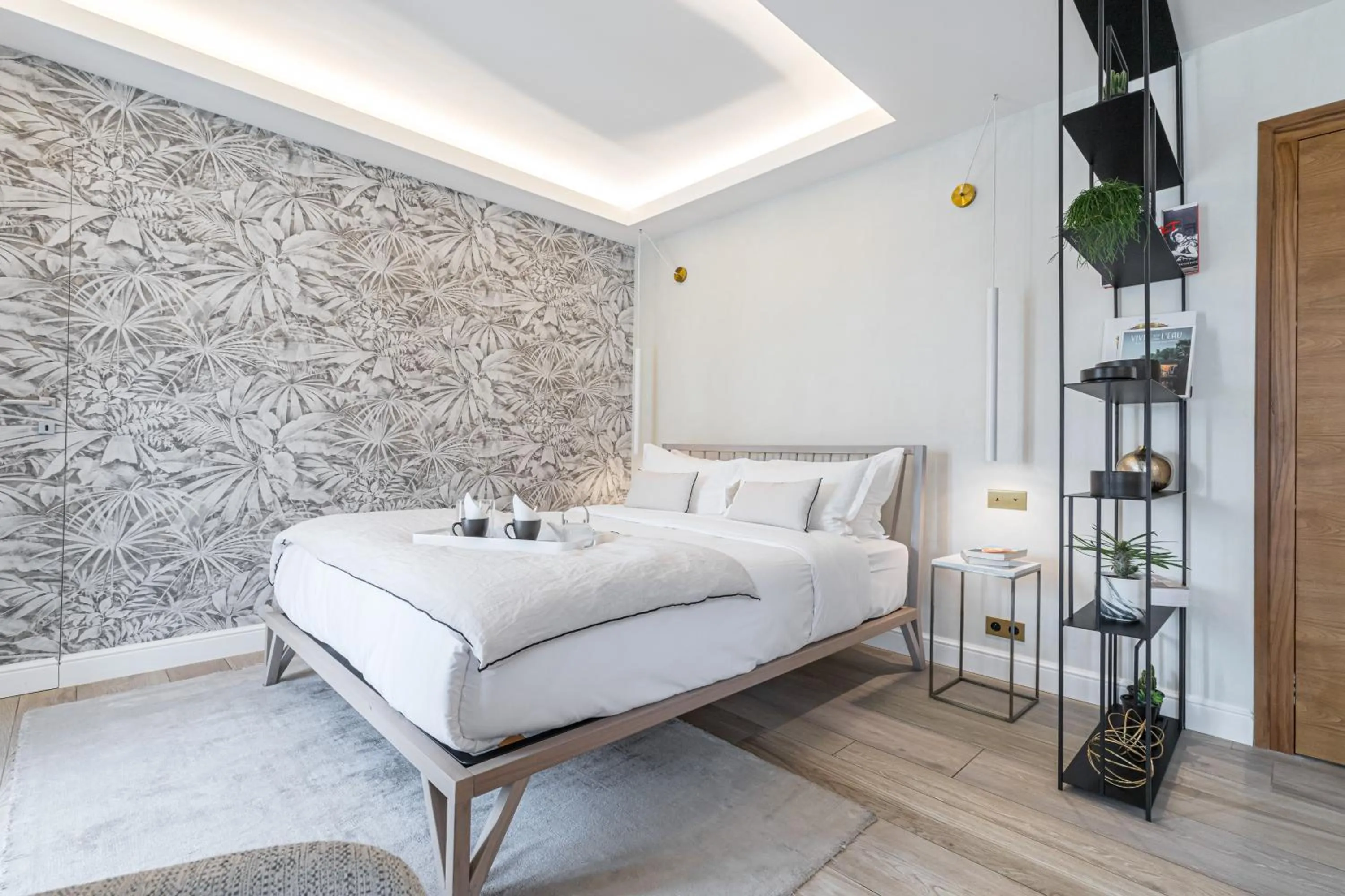 Bed in Le Dortoir Boutique Suites