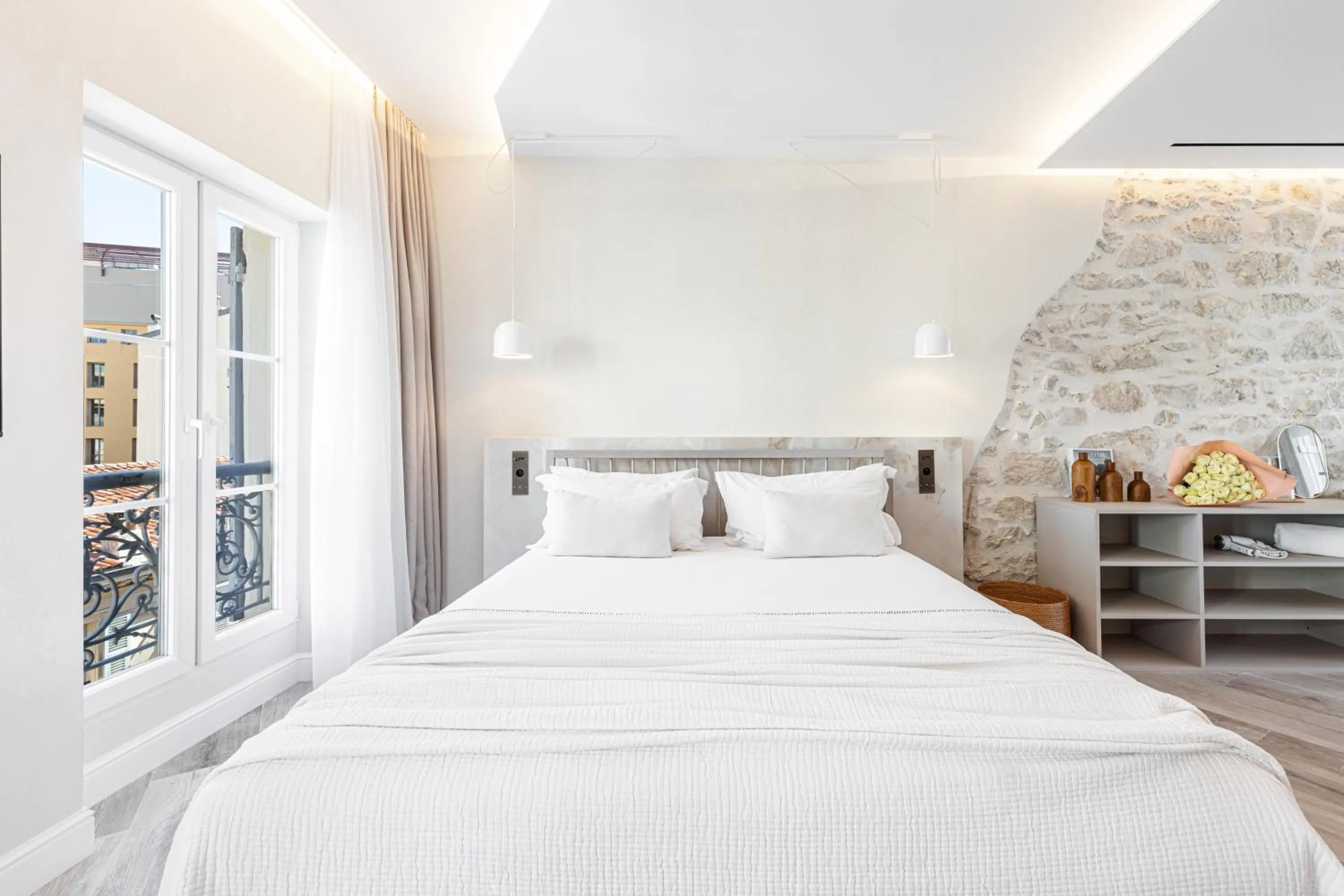 Bed in Le Dortoir Boutique Suites