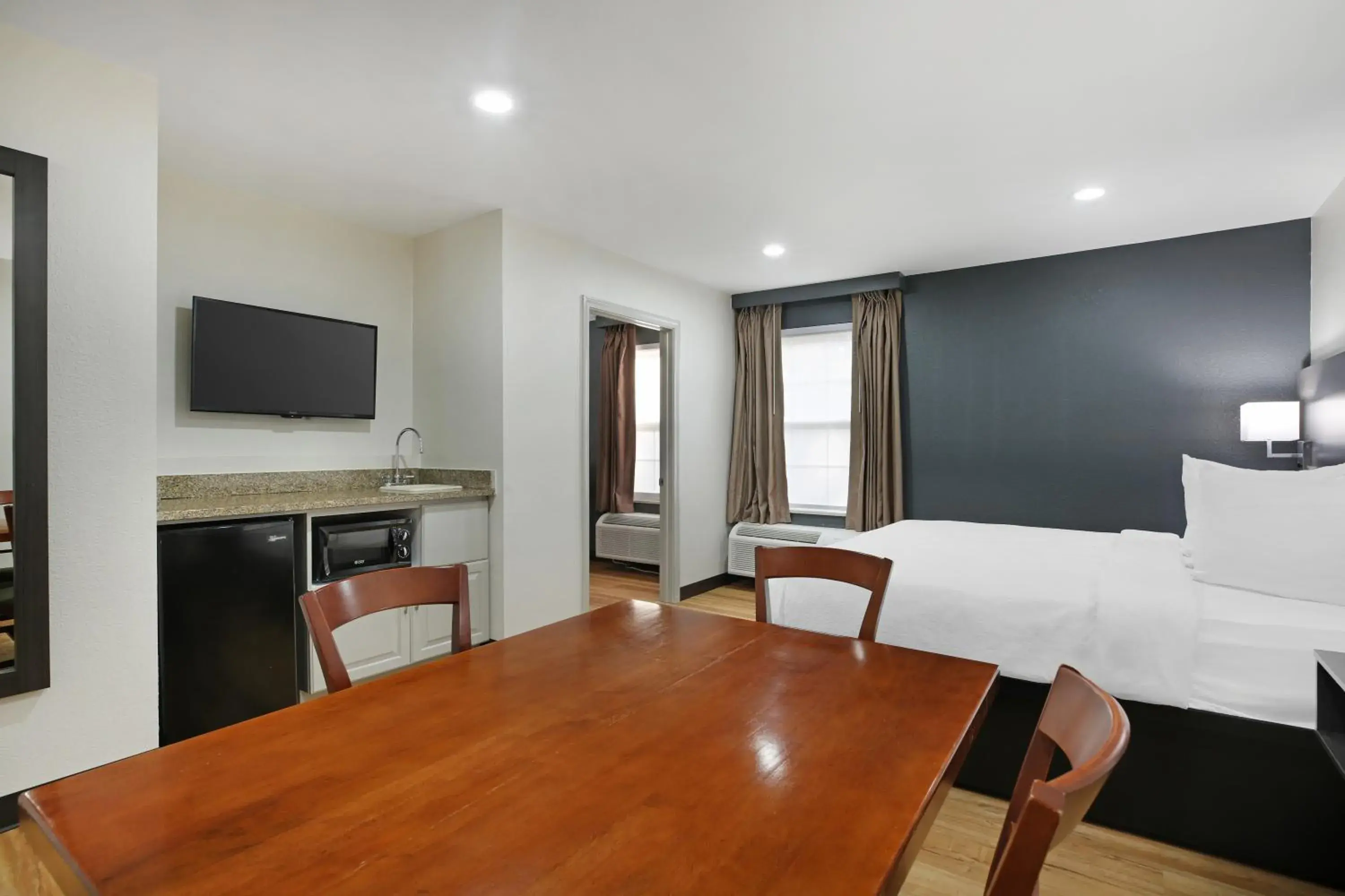 Family Suite with One King Bed, Two Queen Beds and One Sofa Bed - Kitchenette/Non-Smoking in Quality Inn Mystic Family Suite with One King Bed, Two Queen Beds and One Sofa Bed - Kitchenette/Non-Smoking in Quality Inn Mystic