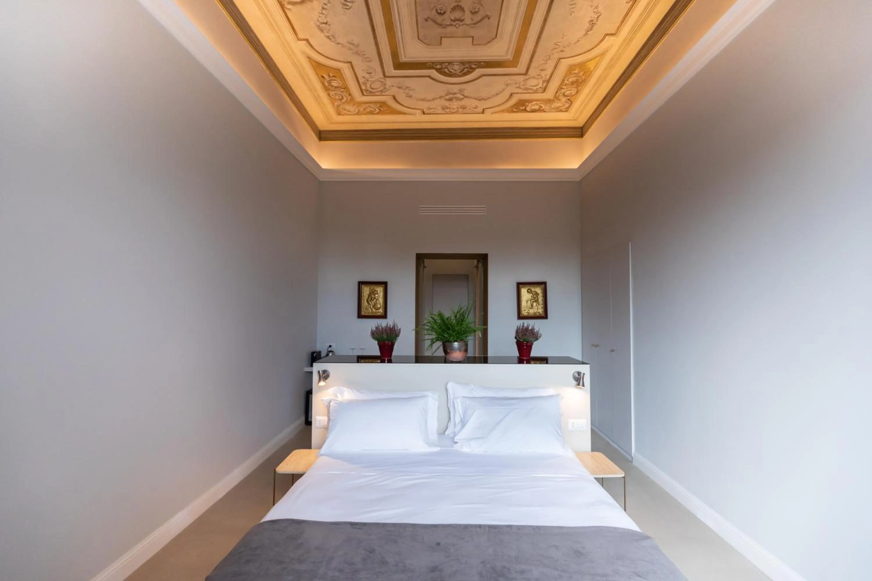 Bed in Domus 21 Luxury Suites