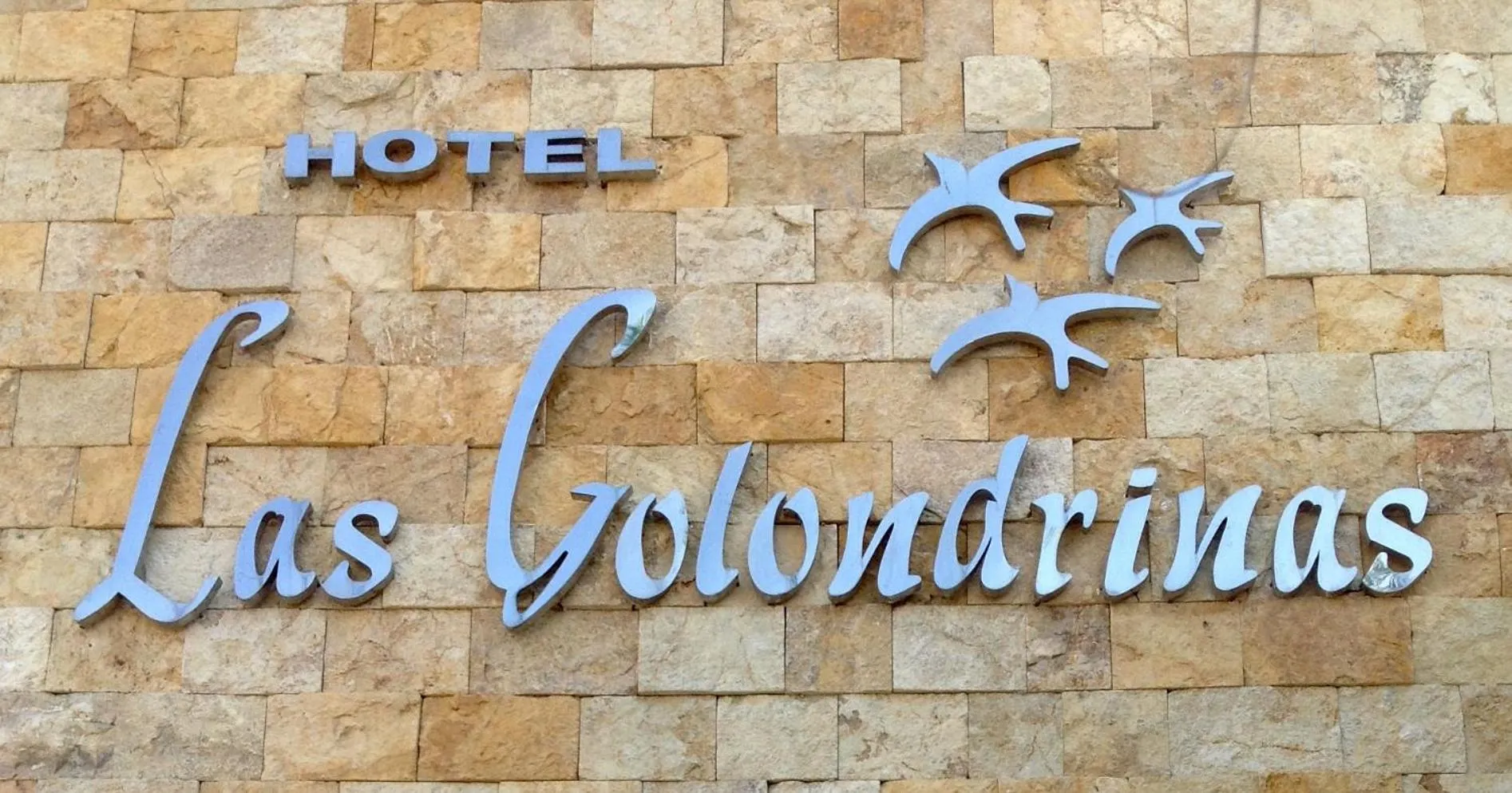 Logo/Certificate/Sign in Hotel Las Golondrinas
