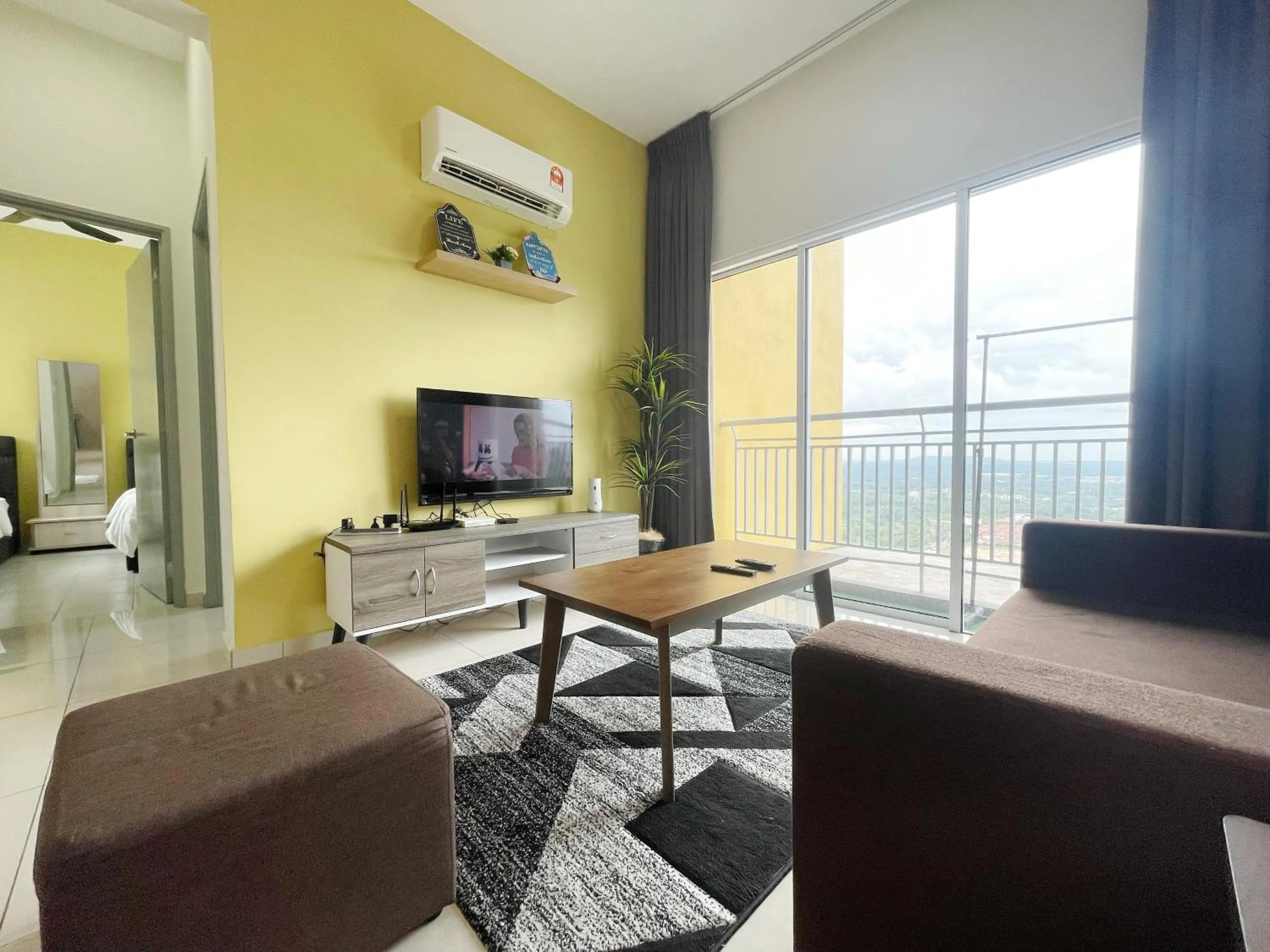 Living room in MesaHill Homestay, Nilai by S&T Homez