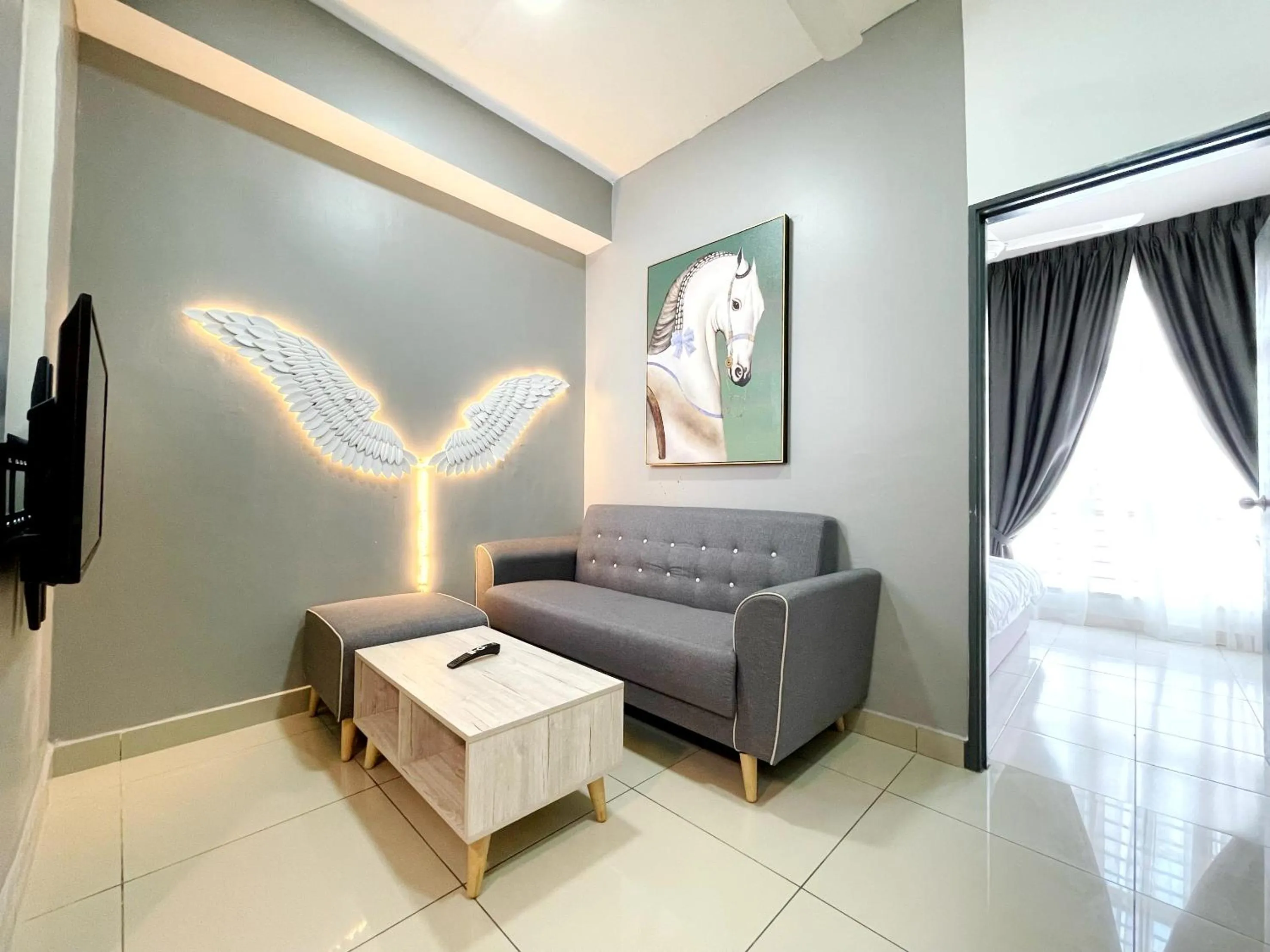 Living room in MesaHill Homestay, Nilai by S&T Homez