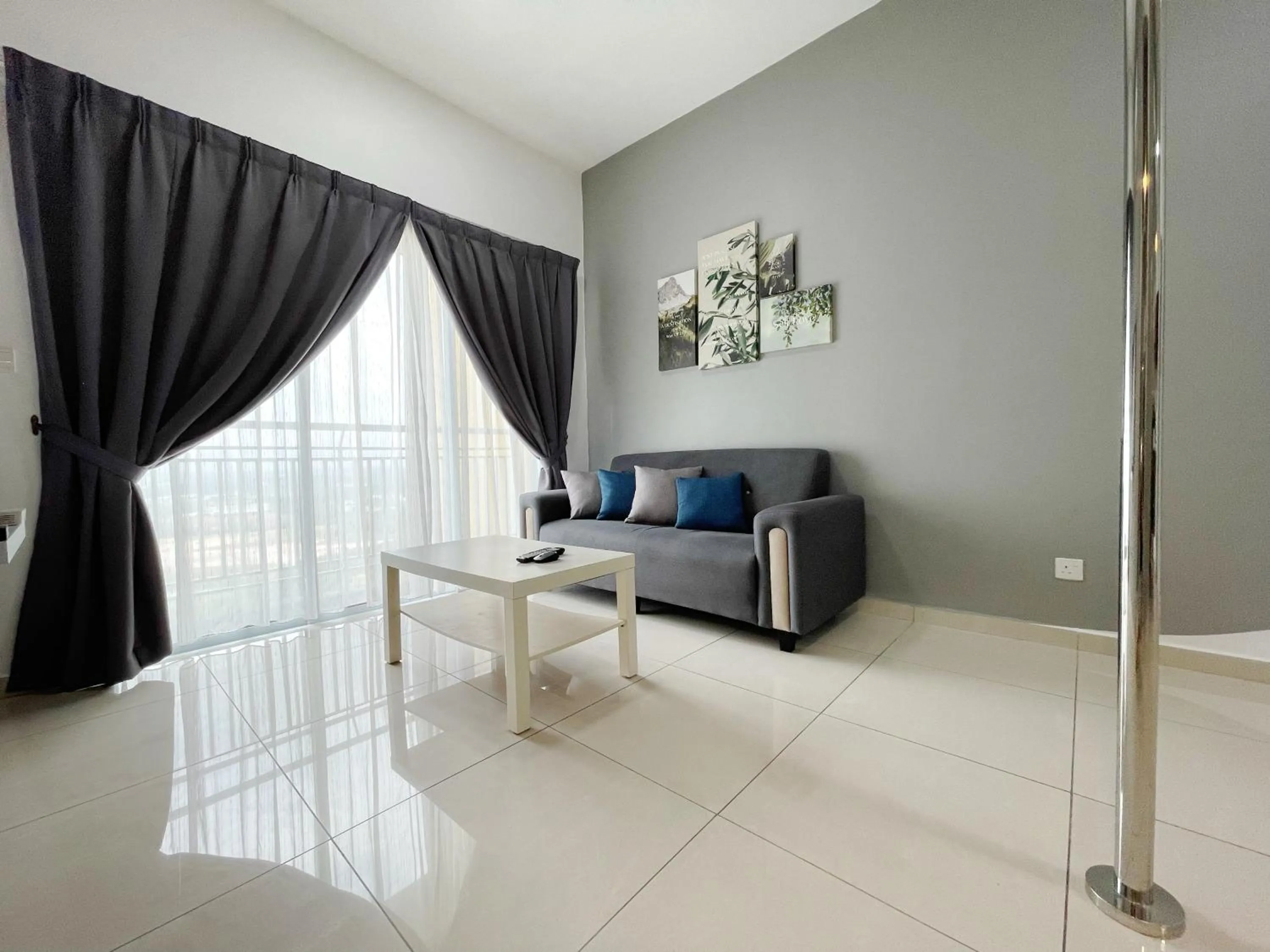 Living room in MesaHill Homestay, Nilai by S&T Homez