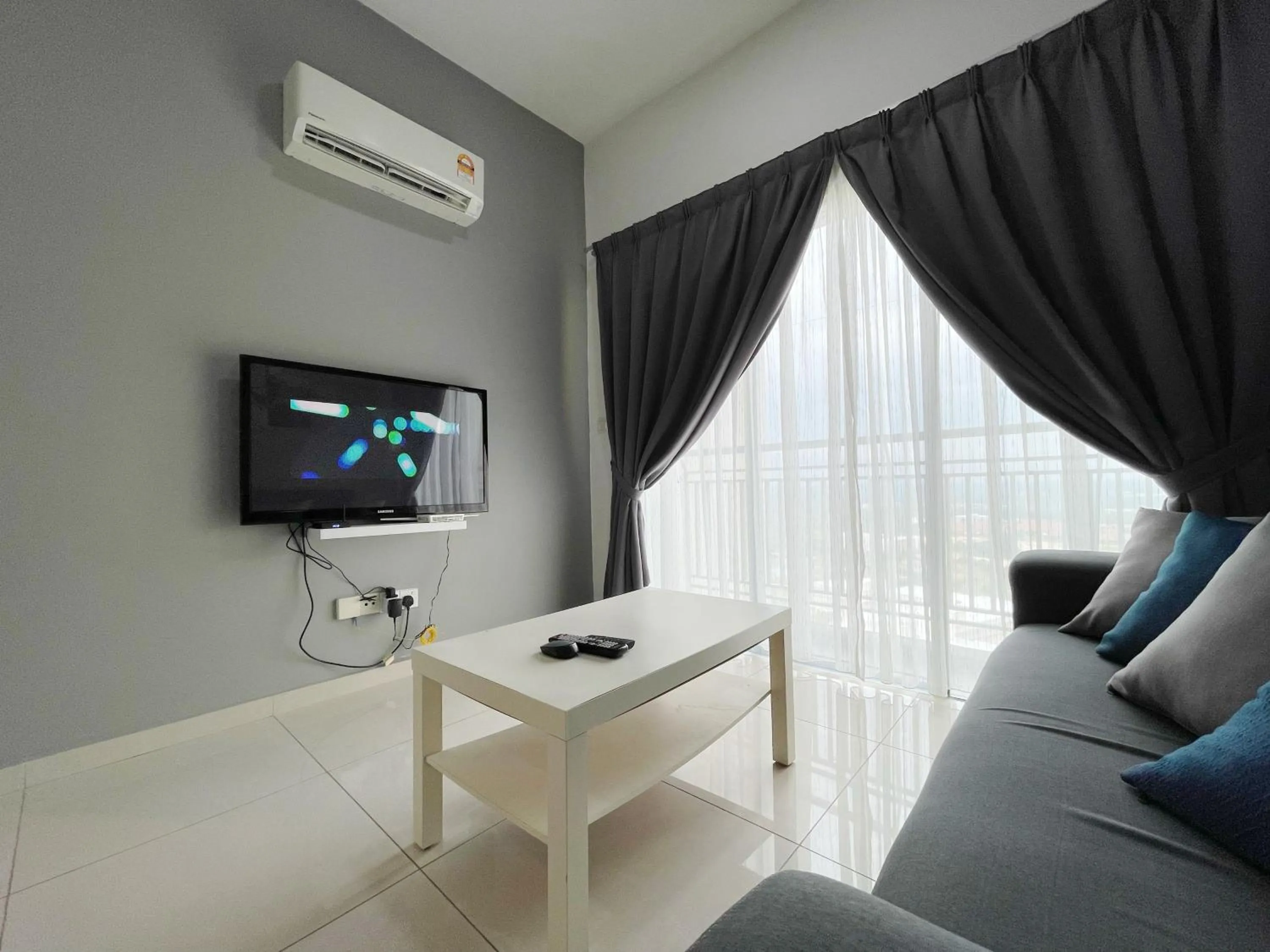 Living room in MesaHill Homestay, Nilai by S&T Homez