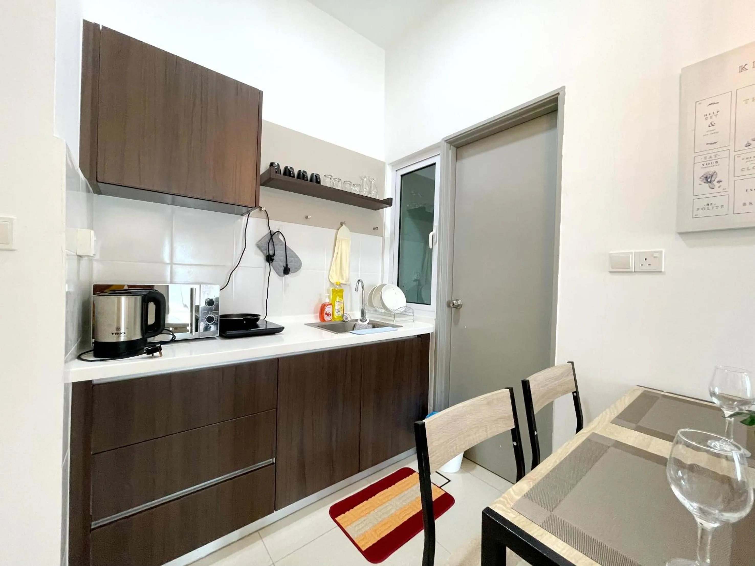 Kitchen or kitchenette in MesaHill Homestay, Nilai by S&T Homez
