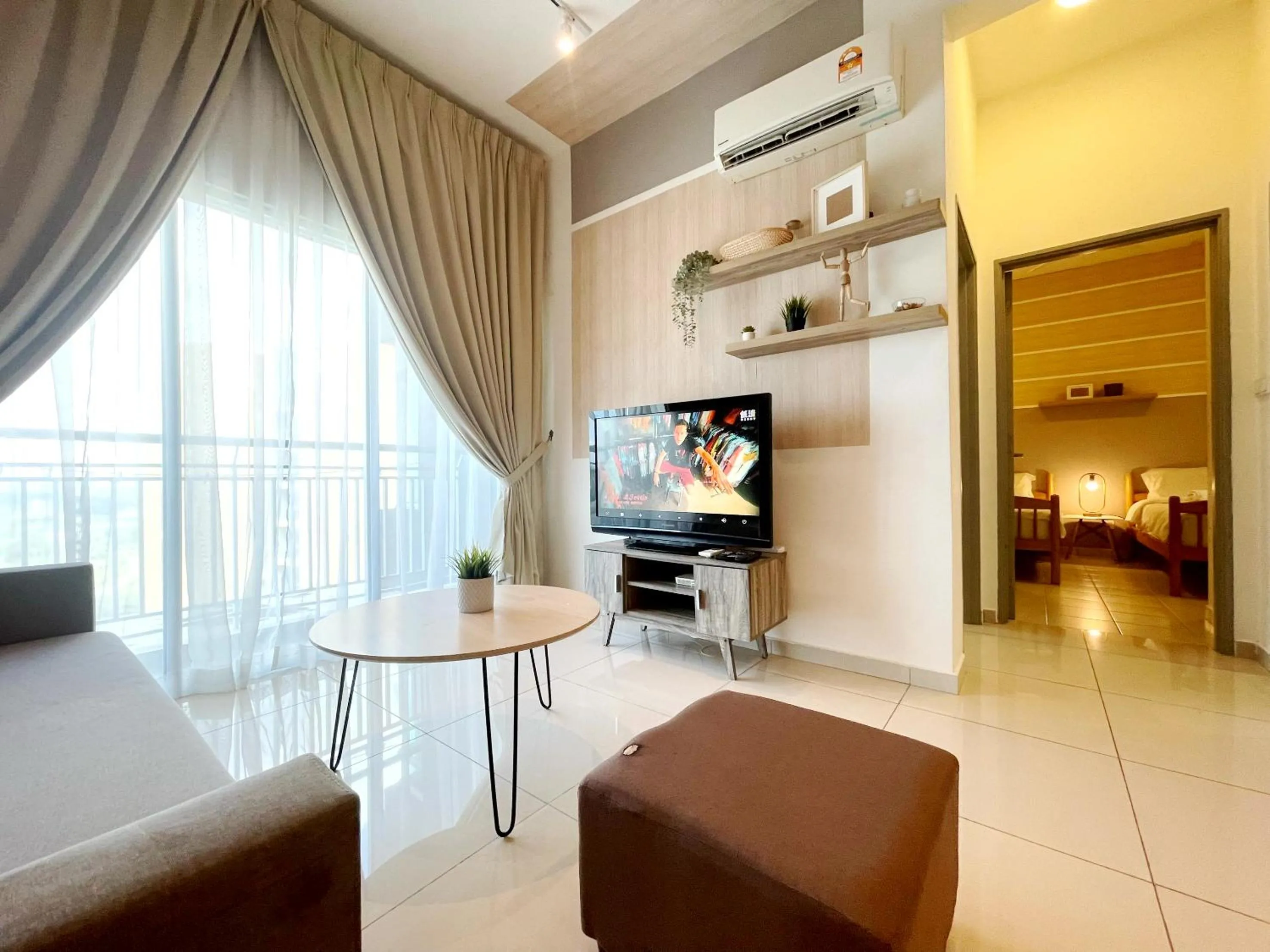 Living room, Bed in MesaHill Homestay, Nilai by S&T Homez