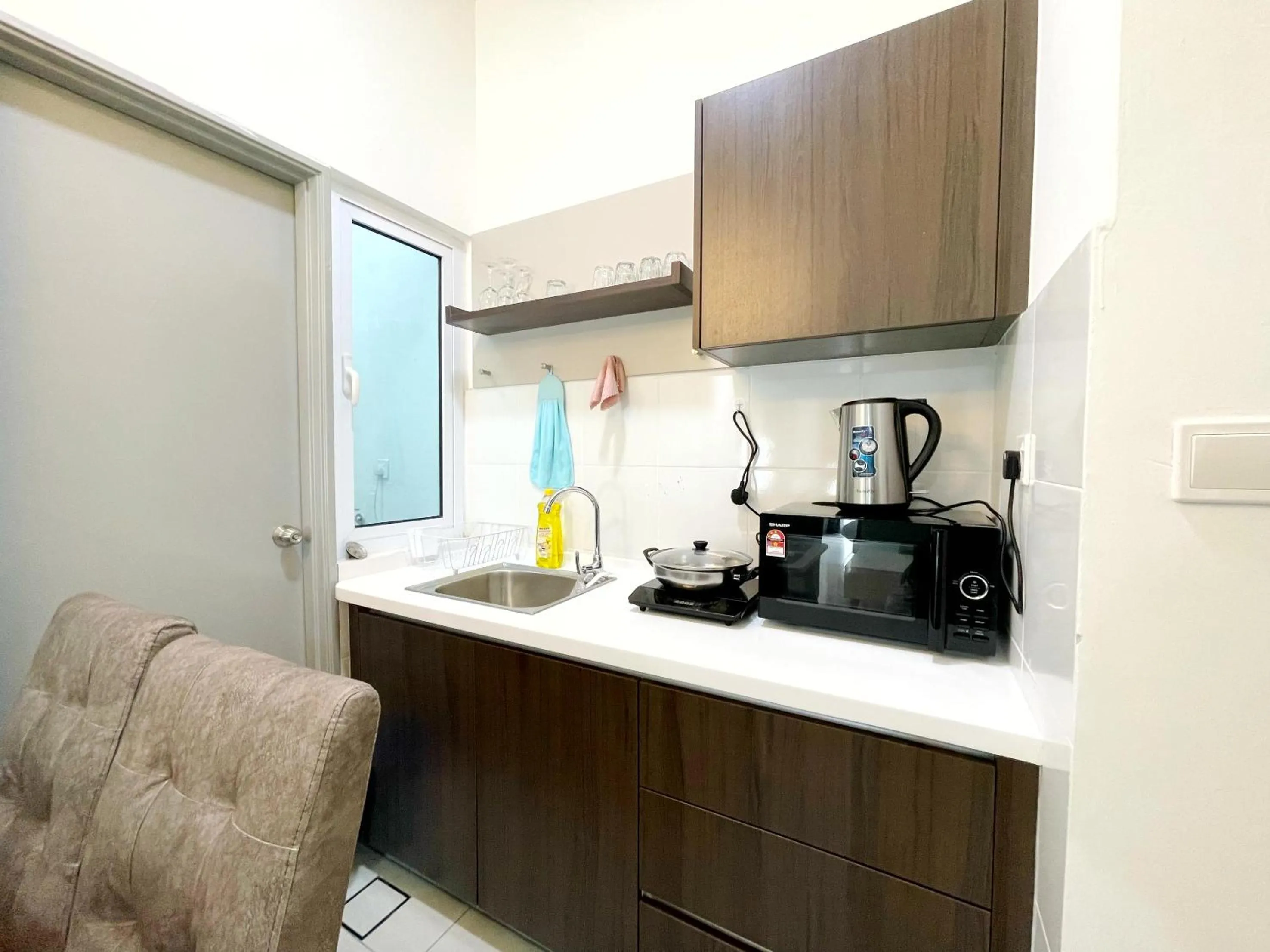 Kitchen or kitchenette in MesaHill Homestay, Nilai by S&T Homez