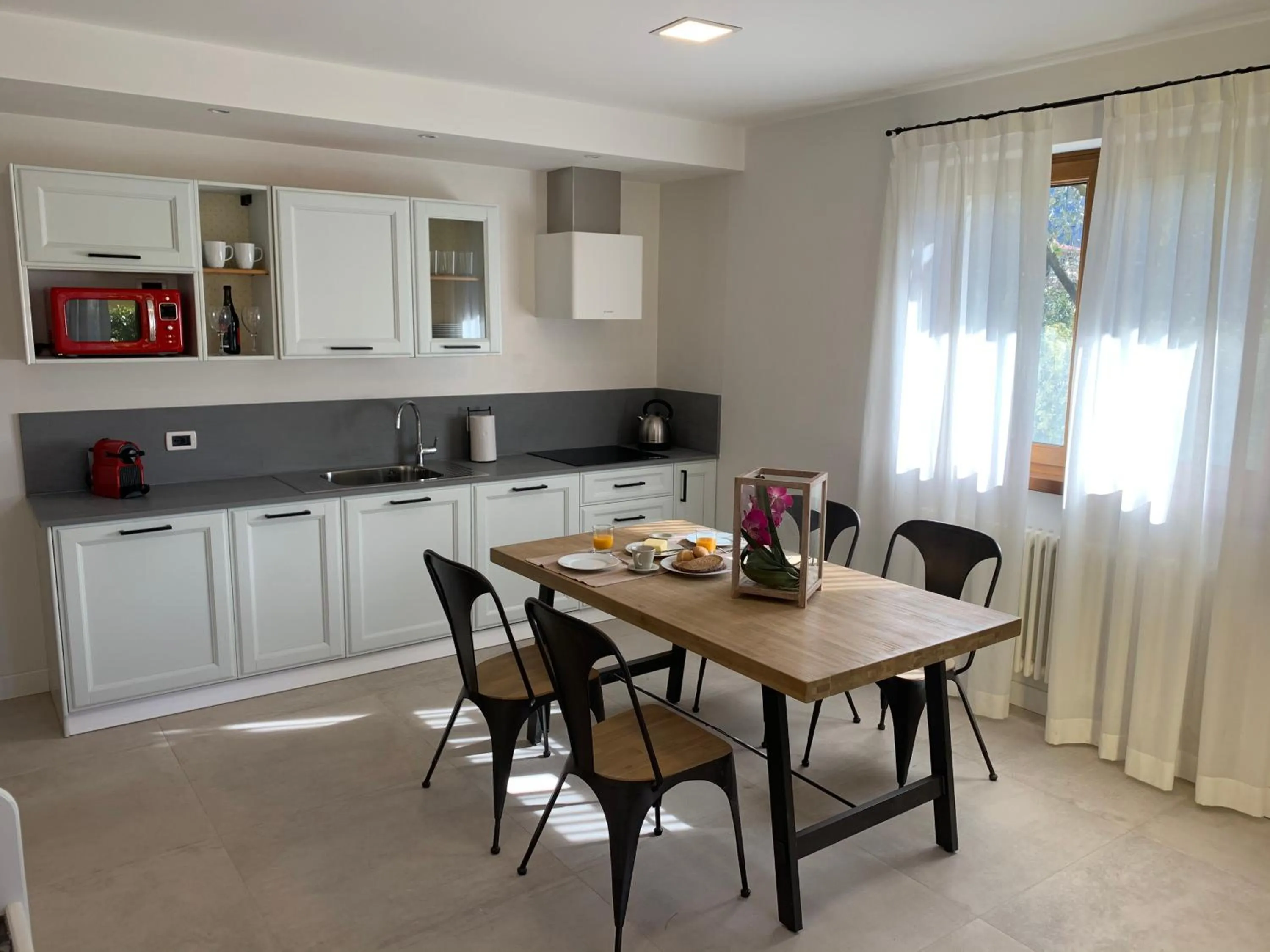 Kitchen or kitchenette in Arcovacanze