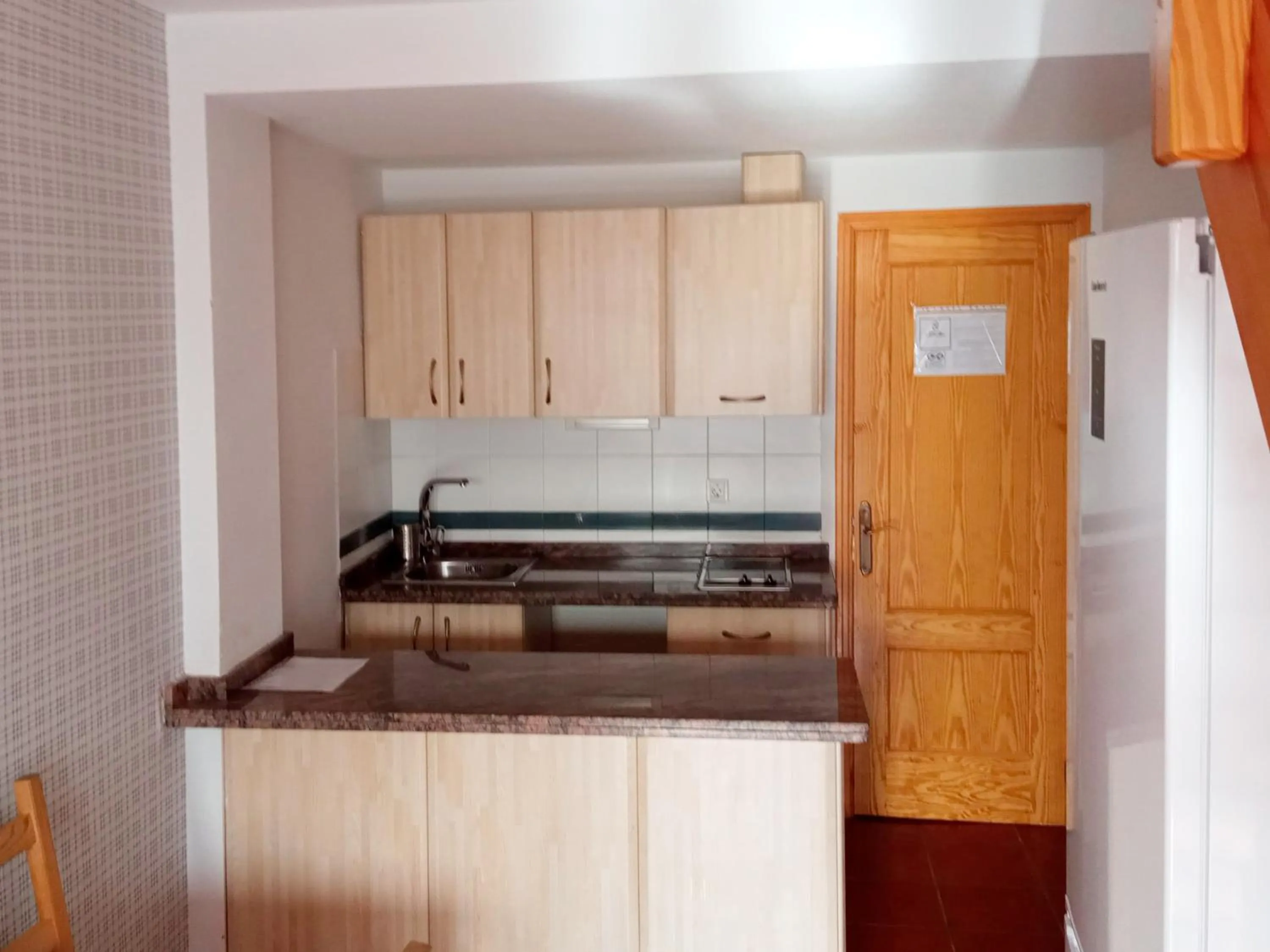 Kitchen or kitchenette in Apartamentos Sierra Nevada 3000