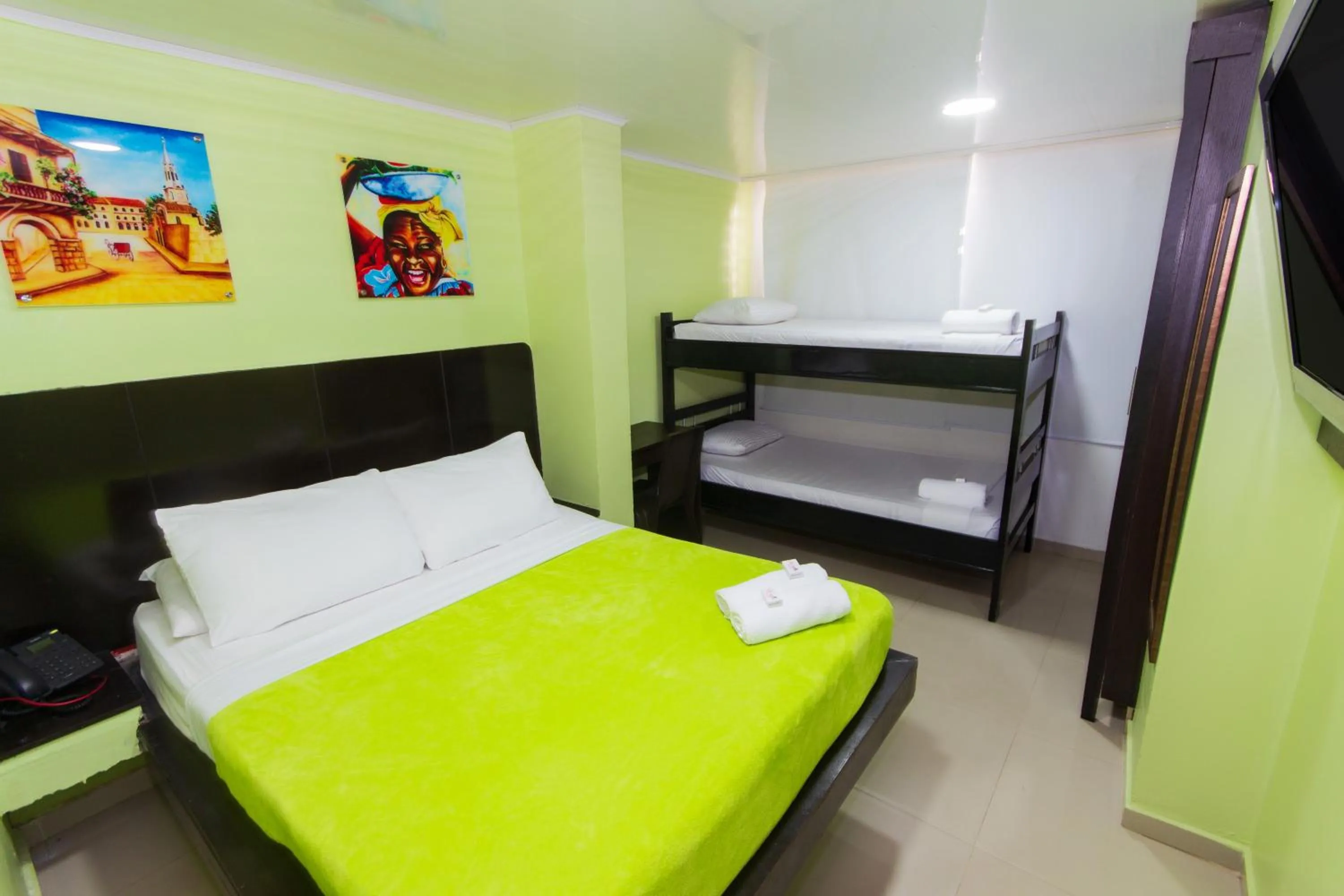 Bed in Hotel Marina Suites By GEH Suites