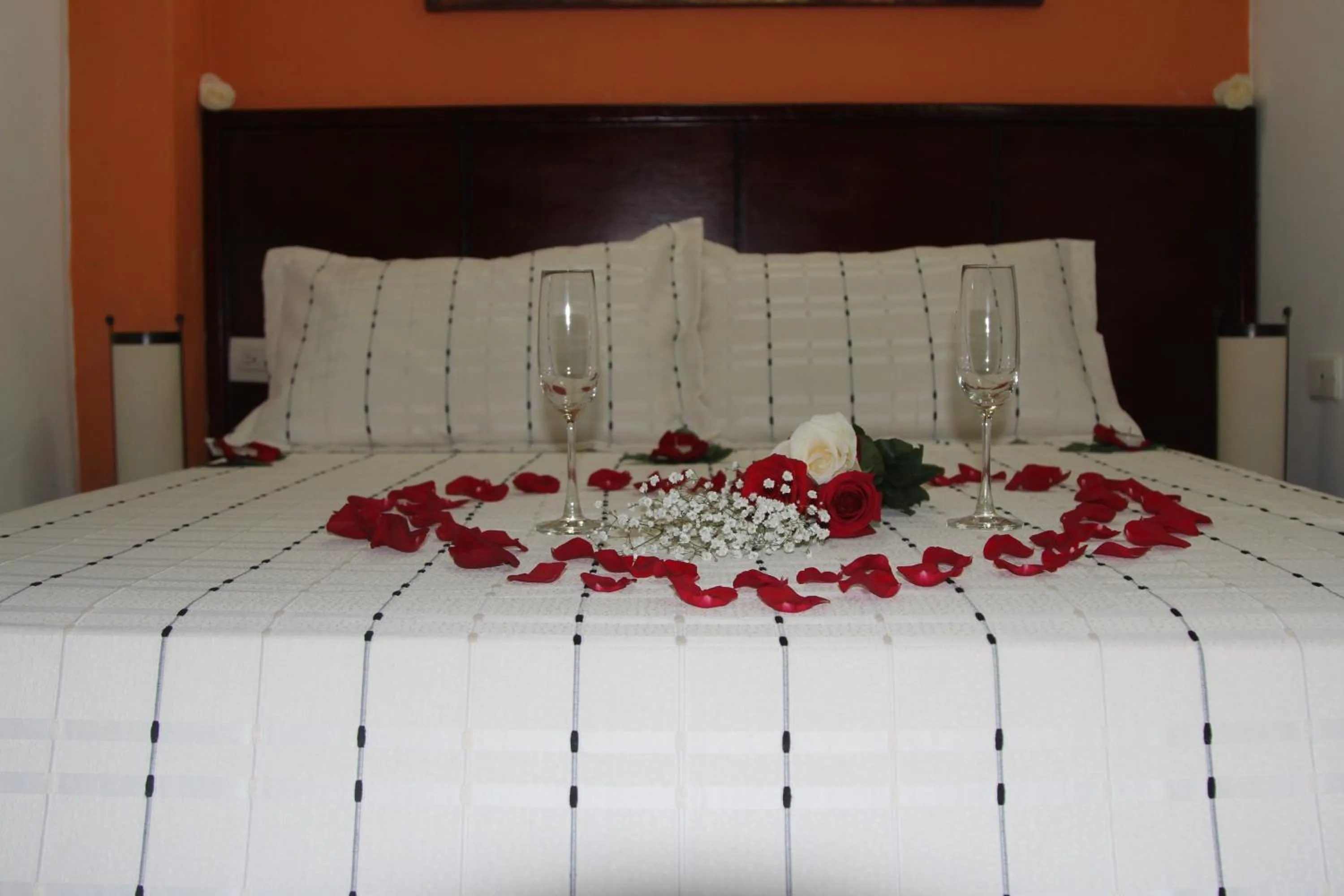 Bed in Hotel Marina Suites By GEH Suites