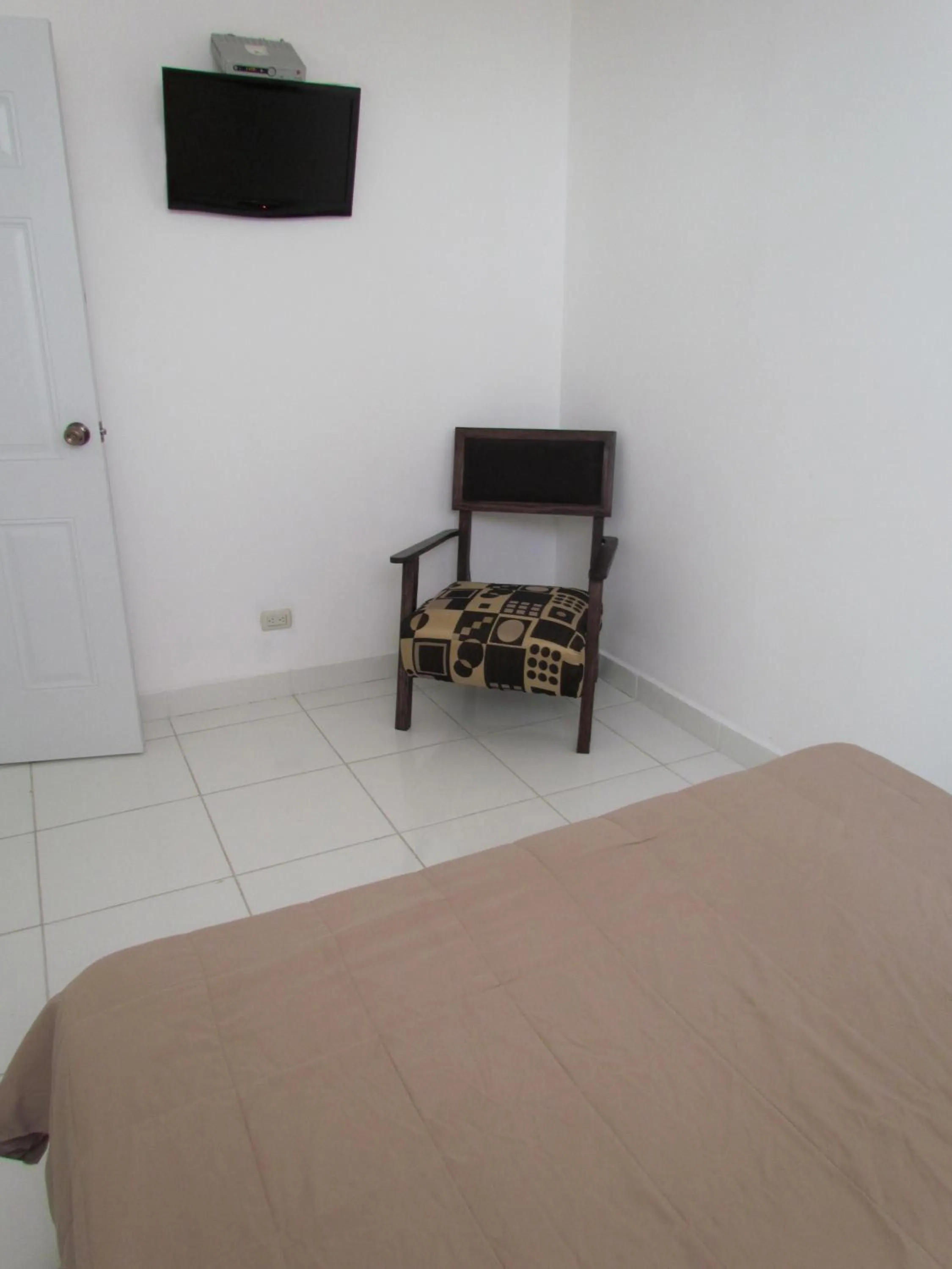 Photo of the whole room, Bed in Plaza Coral Hotel