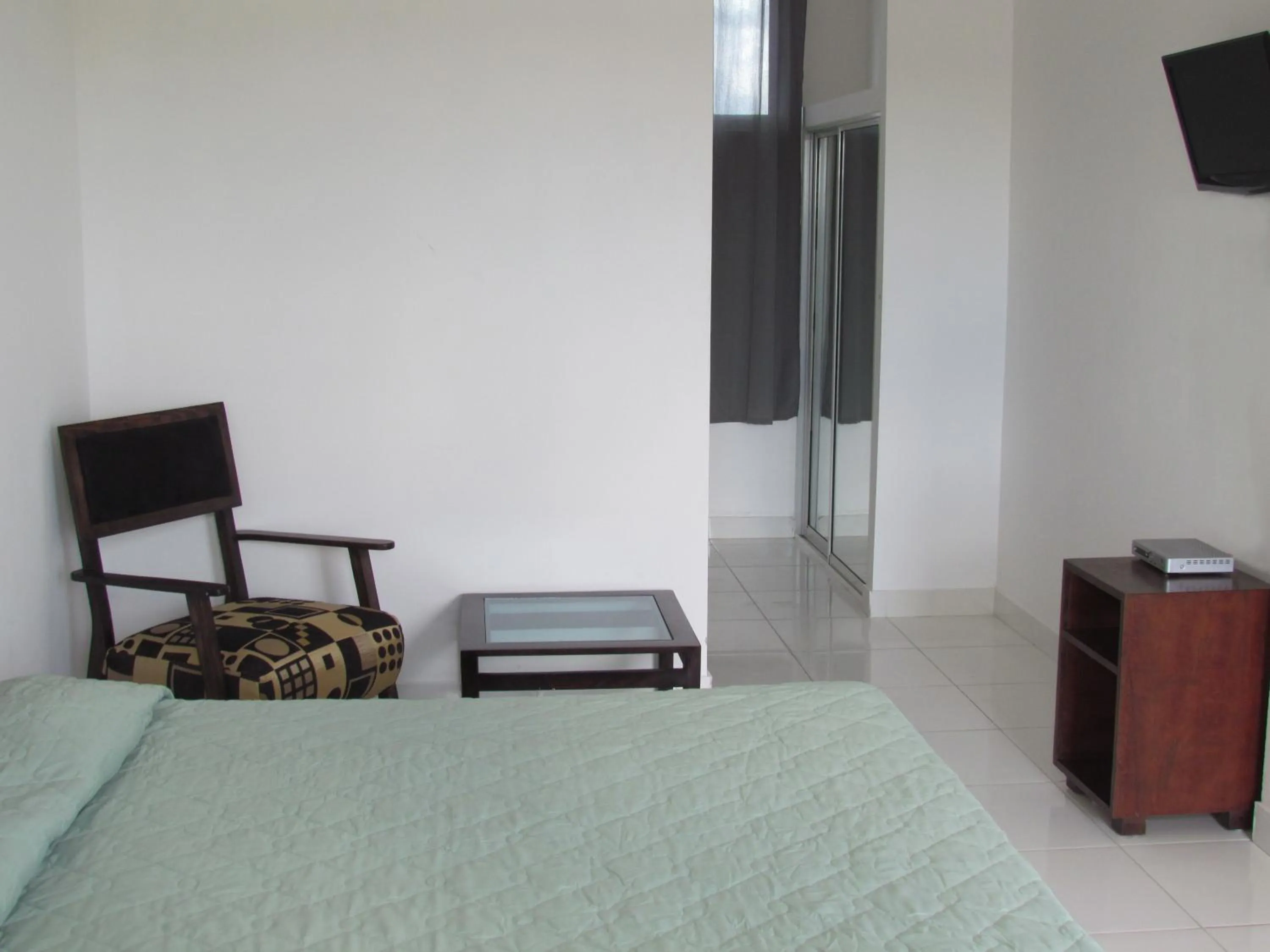 Photo of the whole room, Bed in Plaza Coral Hotel