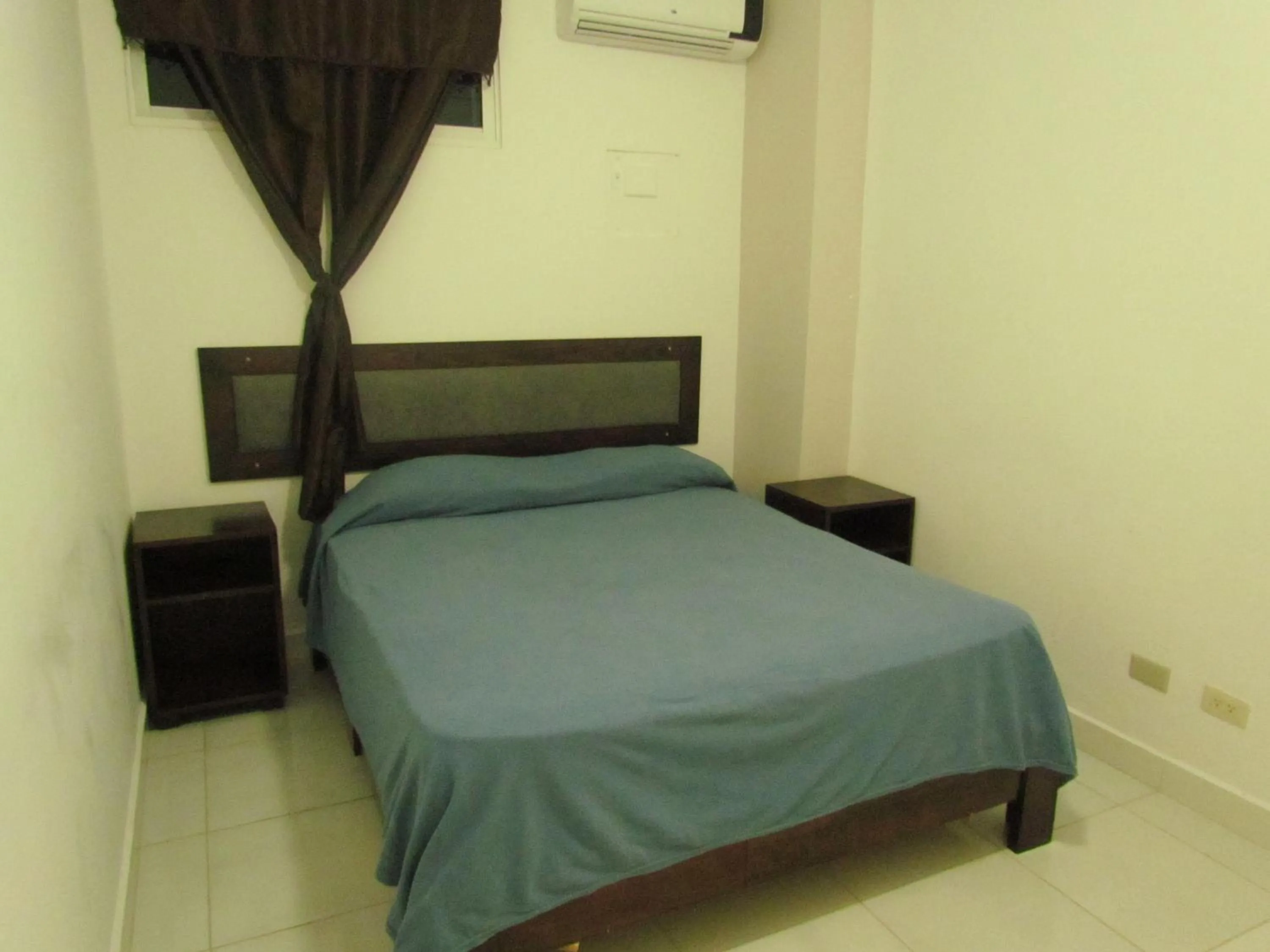 Photo of the whole room, Bed in Plaza Coral Hotel