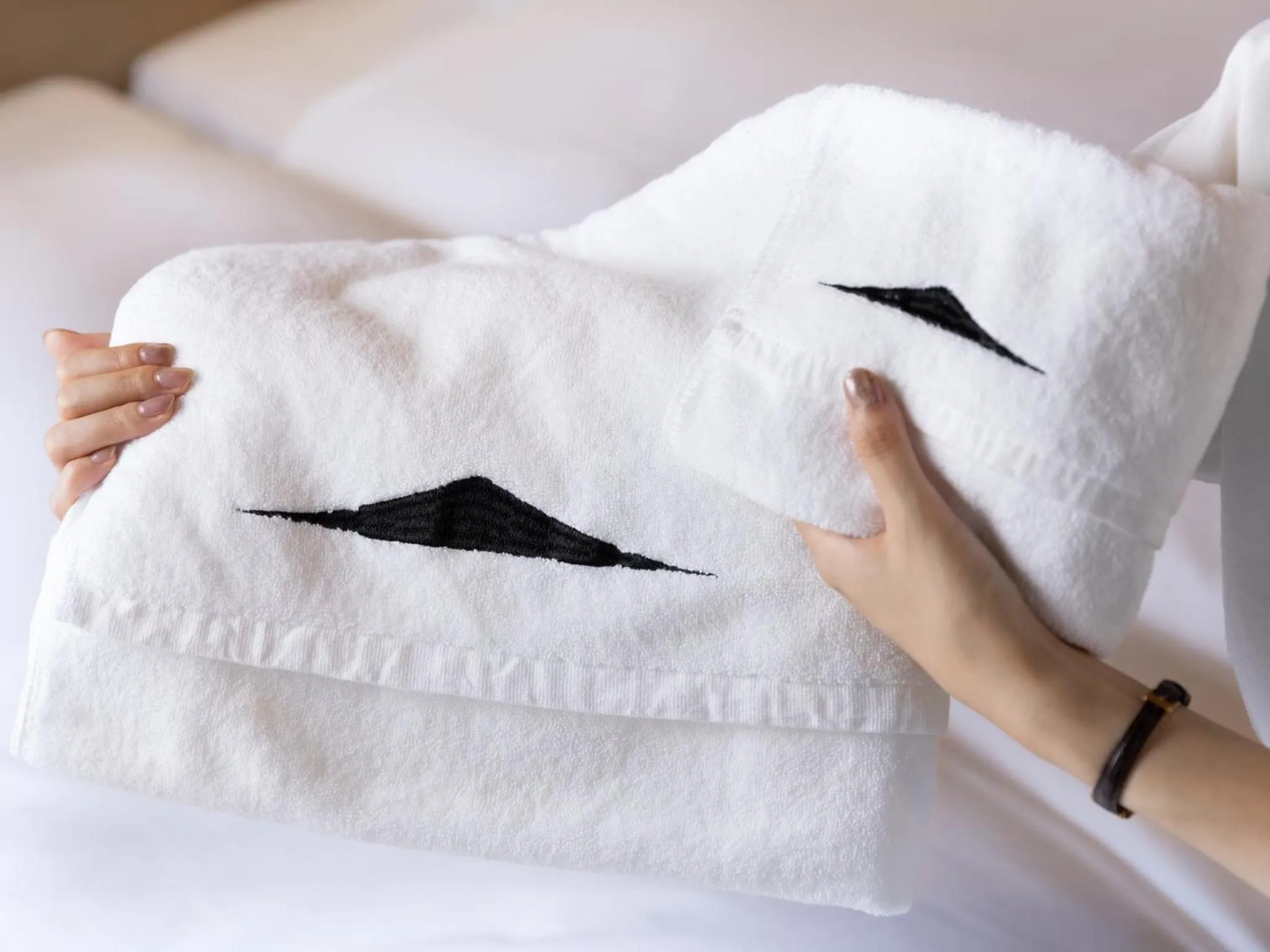 towels, Bed in Kawaguchiko Country Cottage Ban