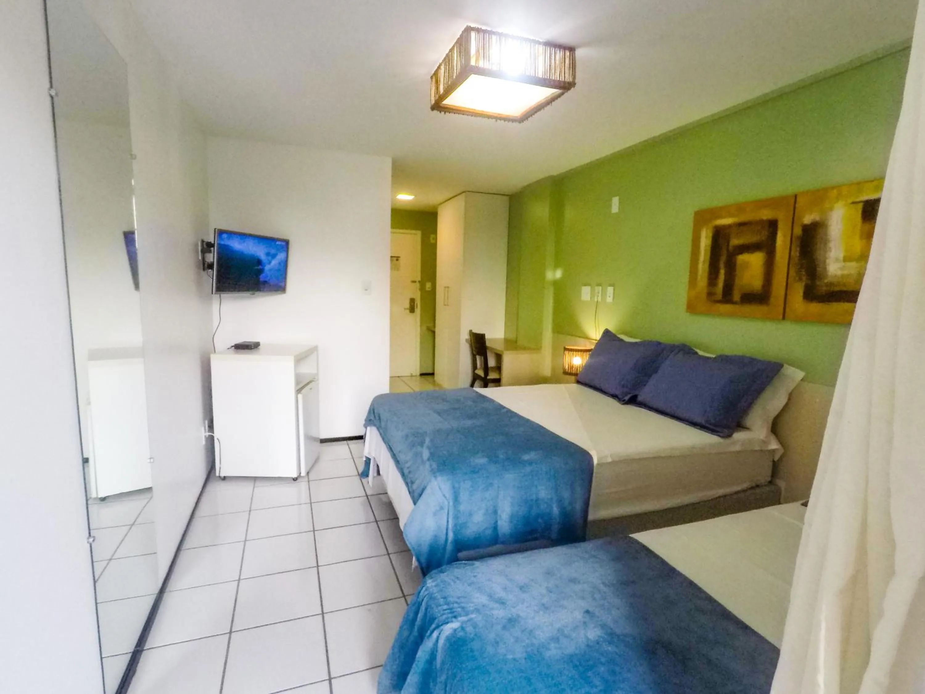 Communal lounge/ TV room, Bed in Grand Lençóis Flat