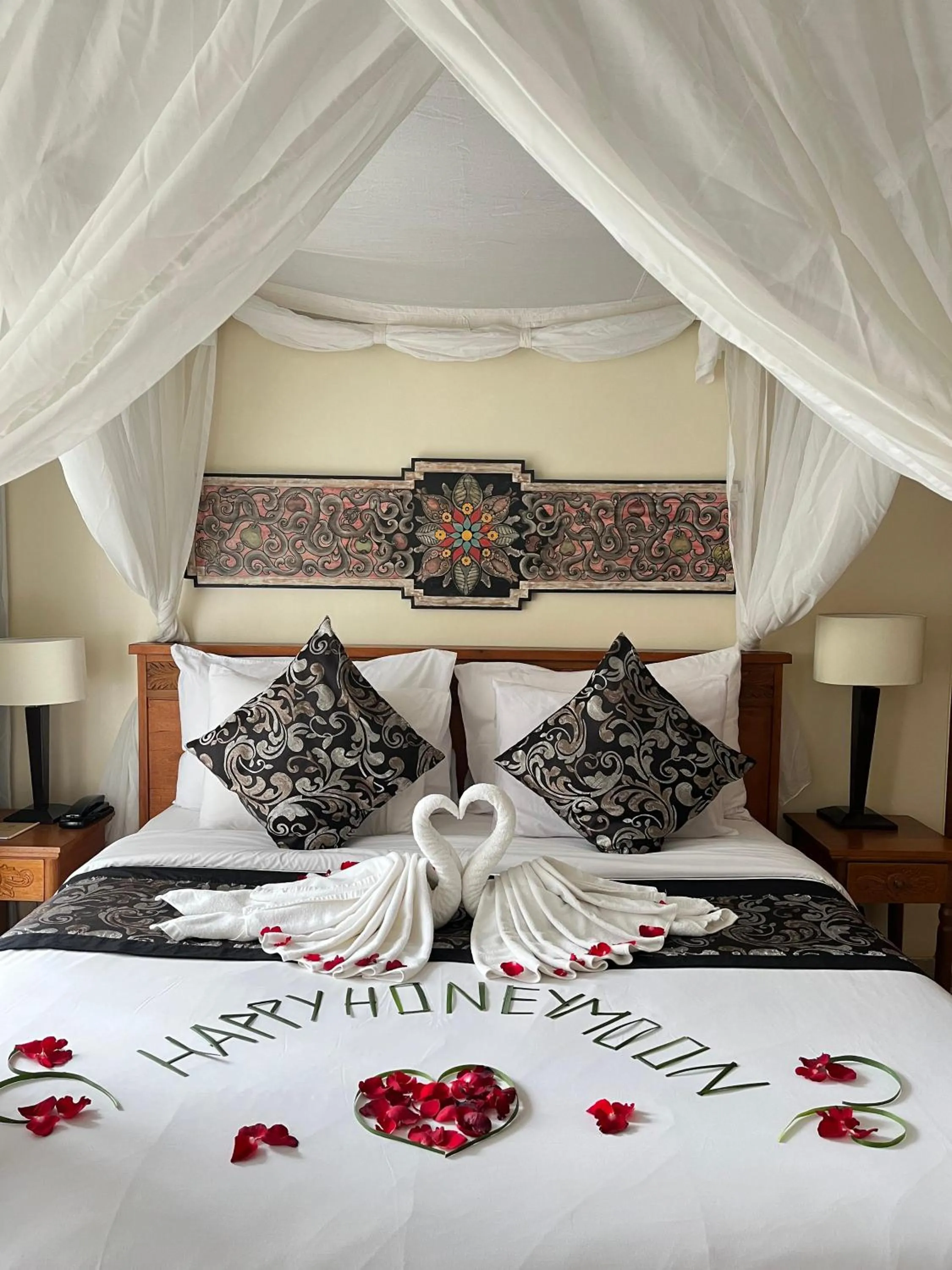 Bed in The Compass Rose Ubud