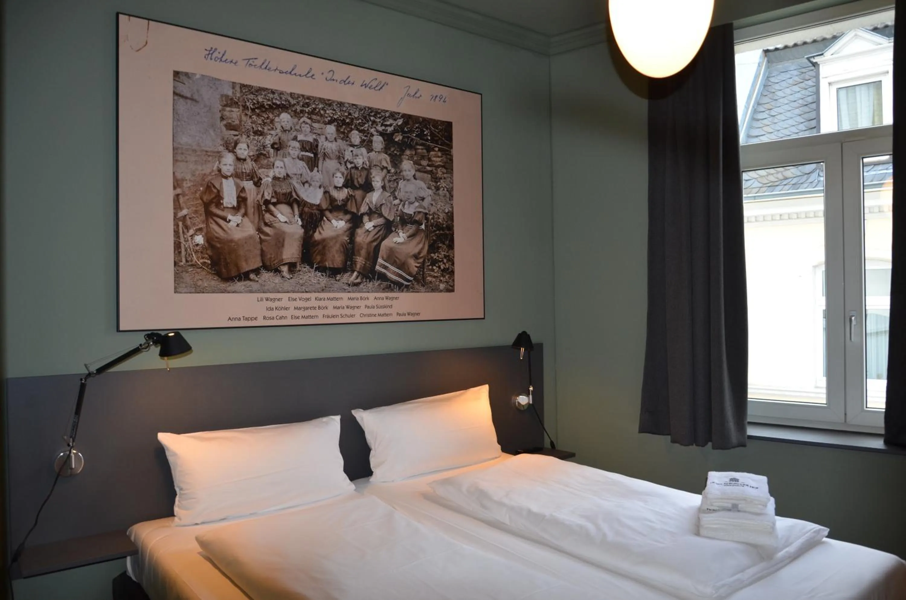 Bed in Storyhotel Bergischer Hof Königswinter