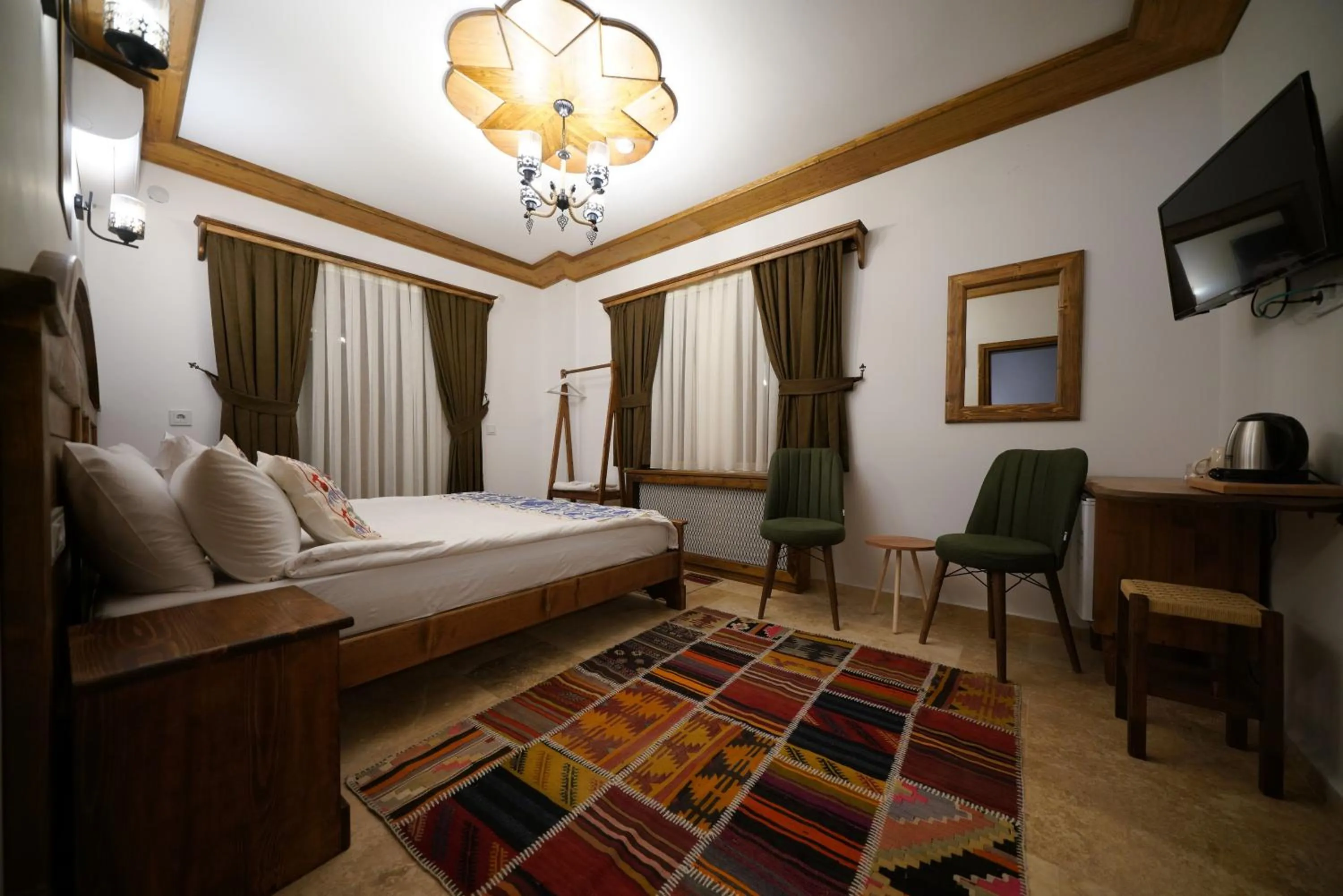 Living room, Bed in Pashahan Hotel