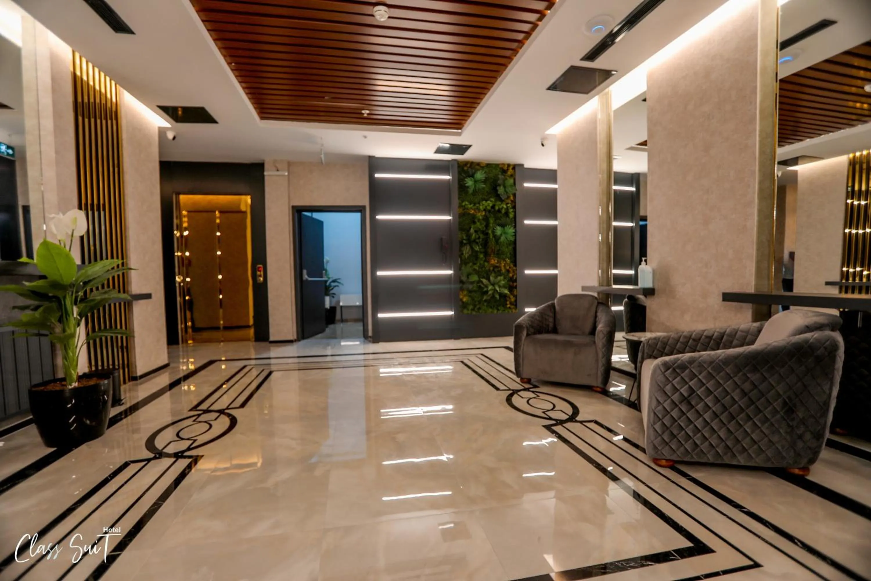 Seating area in Class Suit Hotel