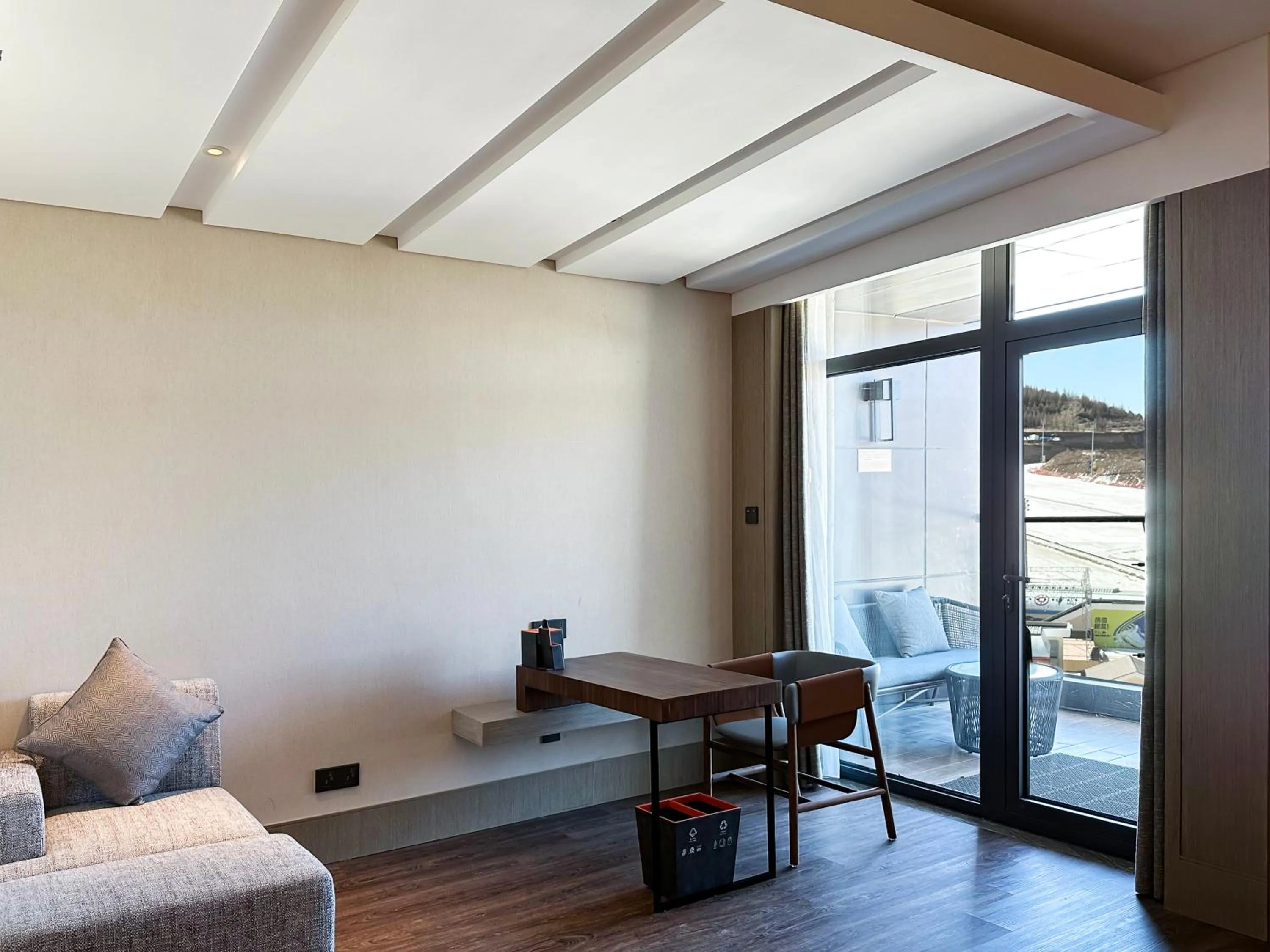 Seating area in Crowne Plaza Chongli Resort by IHG