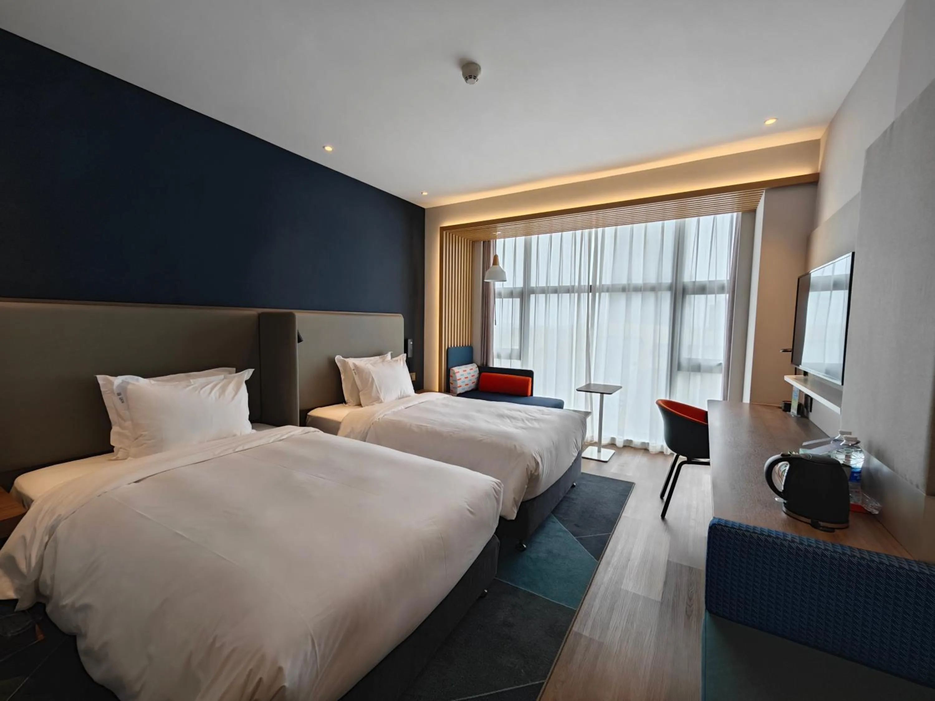 Bed in Holiday Inn Express Shanghai Qingpu New City by IHG
