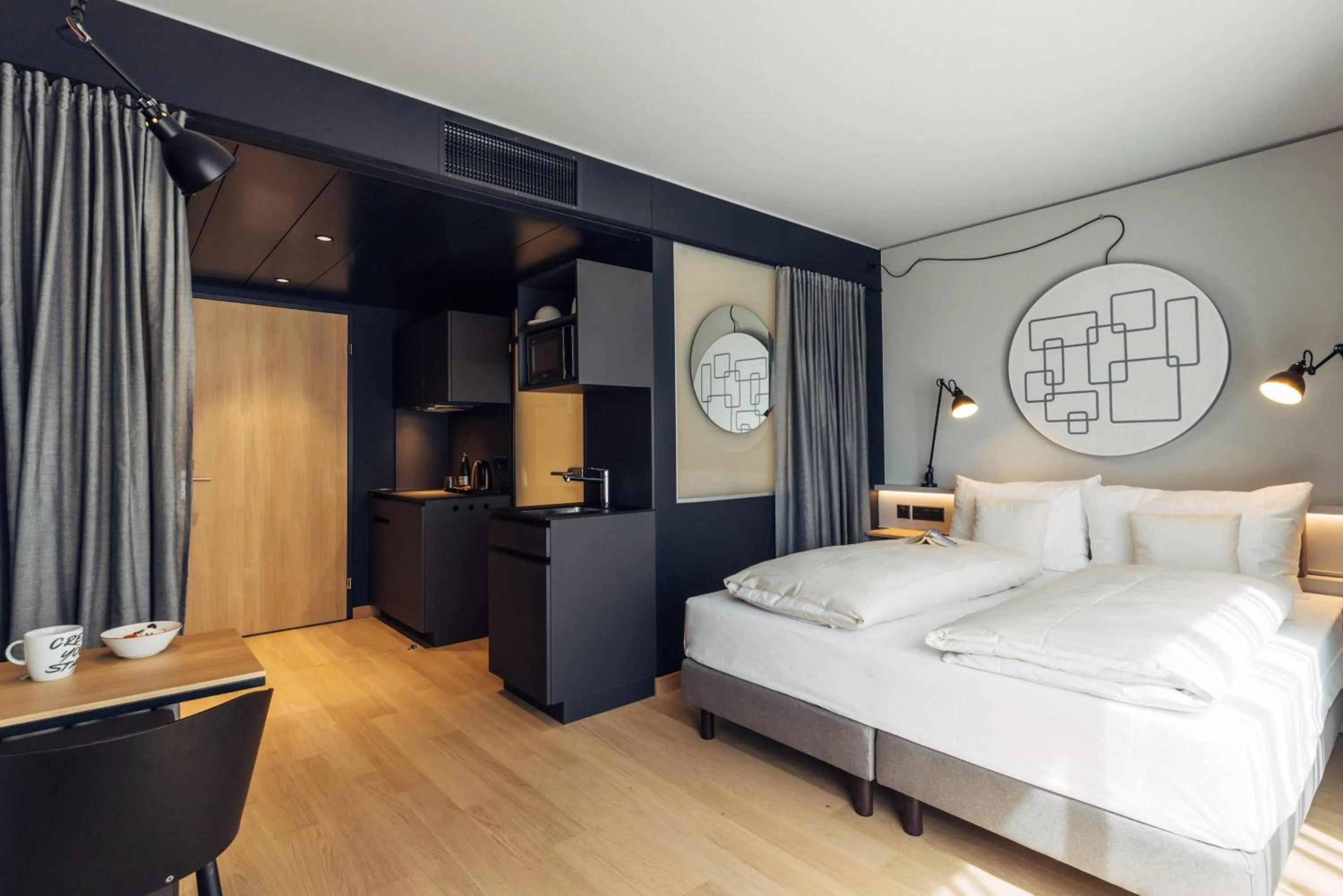 Photo of the whole room, Bed in harry's home Bern-Expo