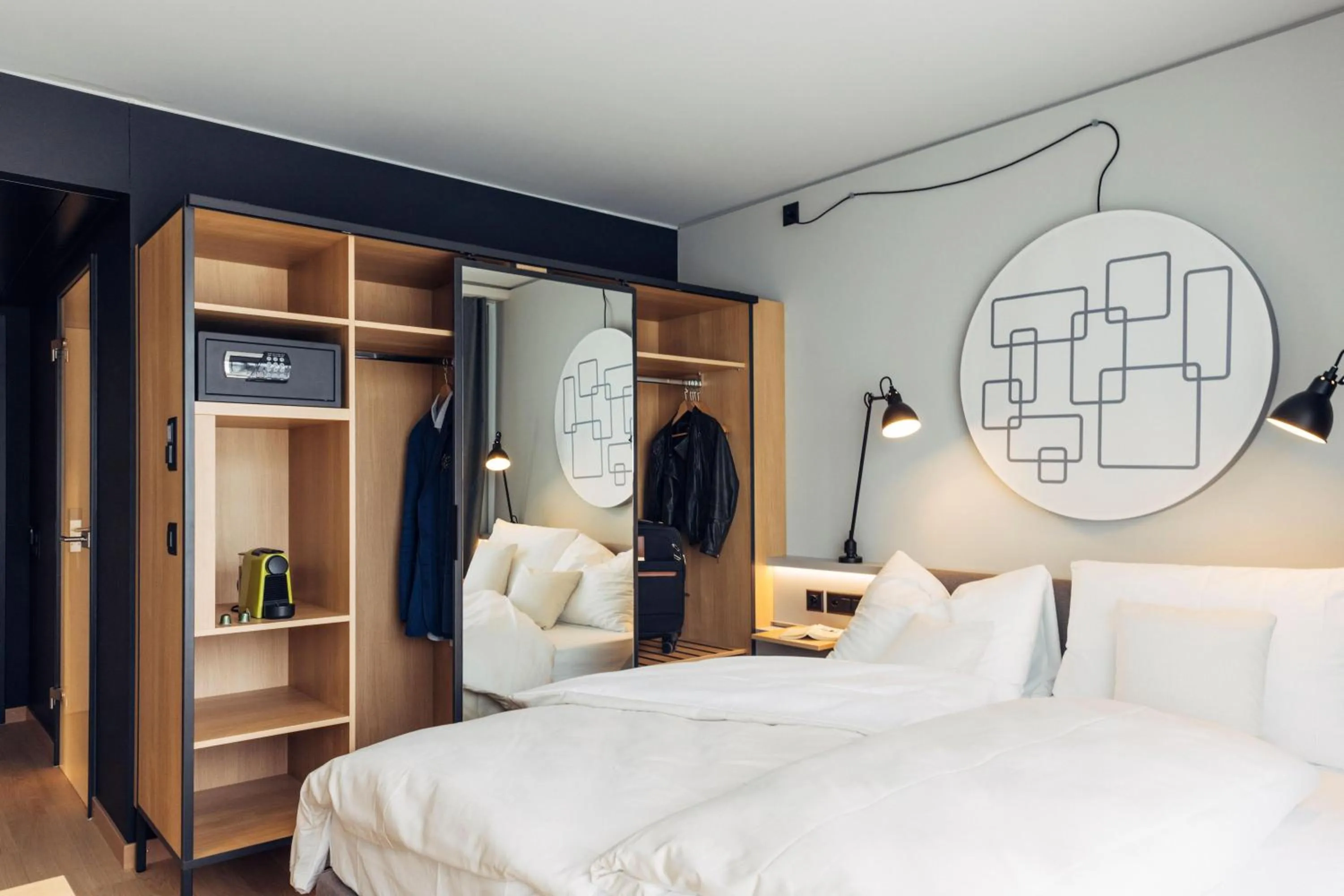 Photo of the whole room, Bed in harry's home Bern-Expo