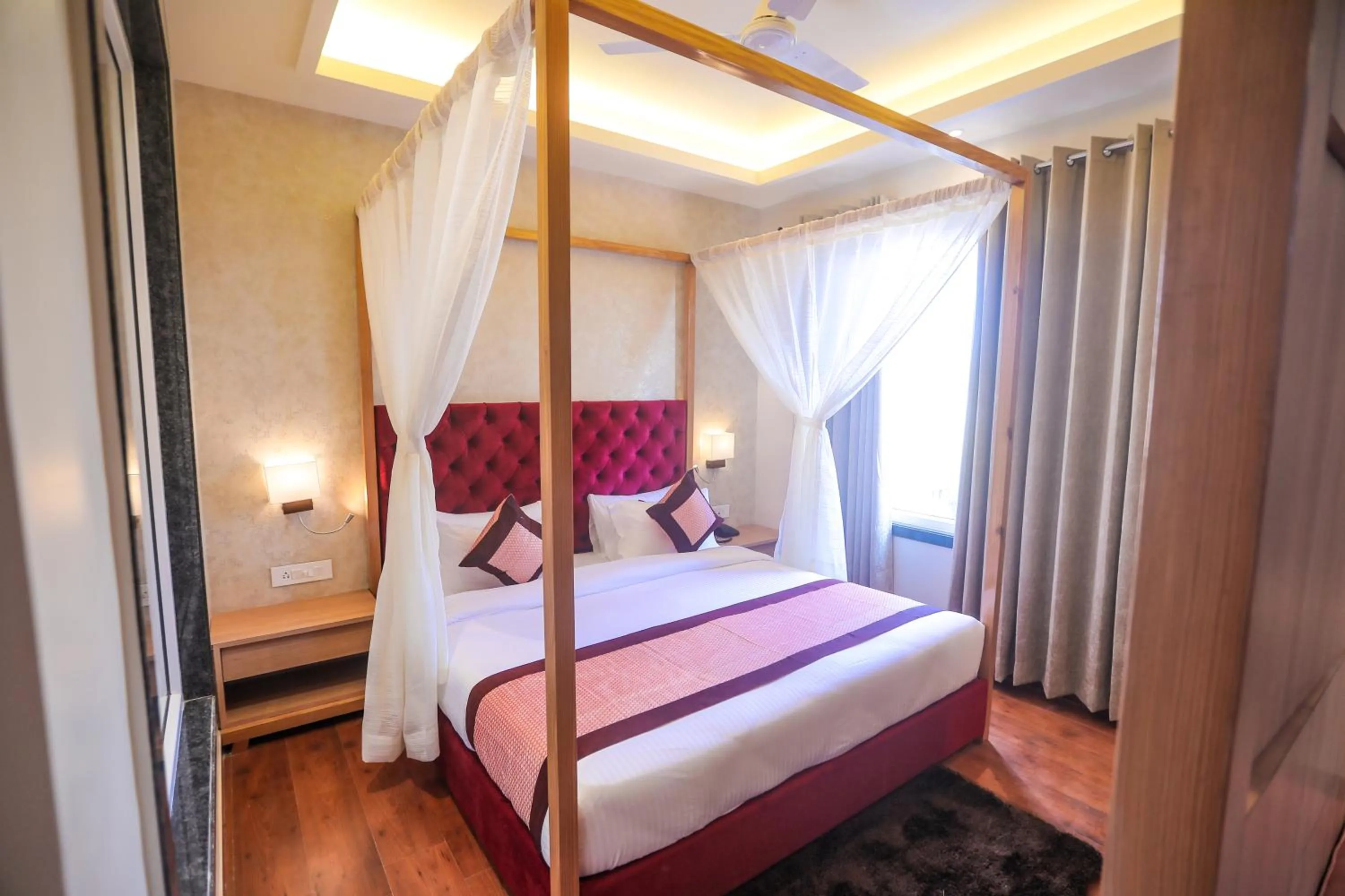 Bed in The Elegance Hotel