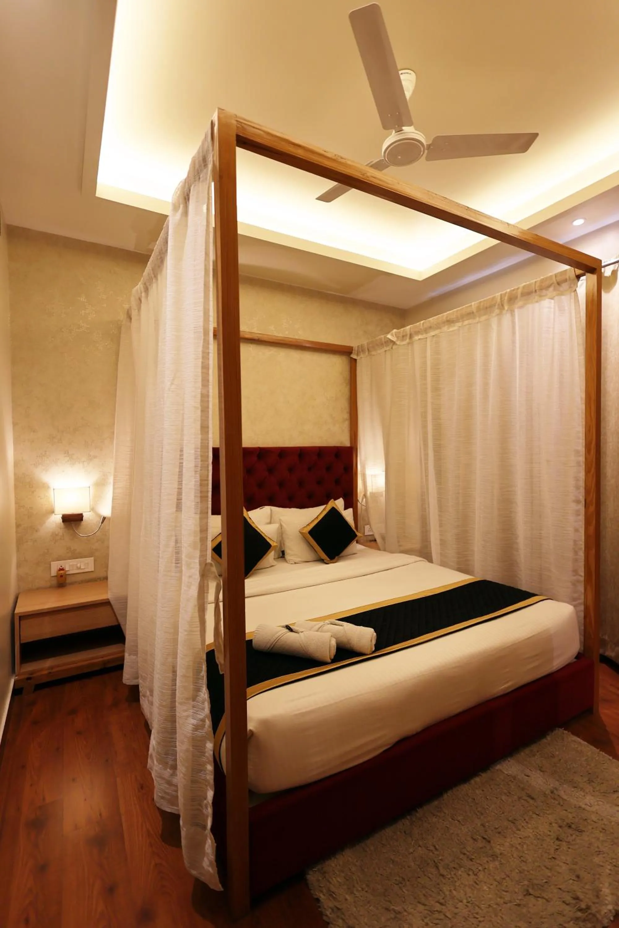 Bed in The Elegance Hotel