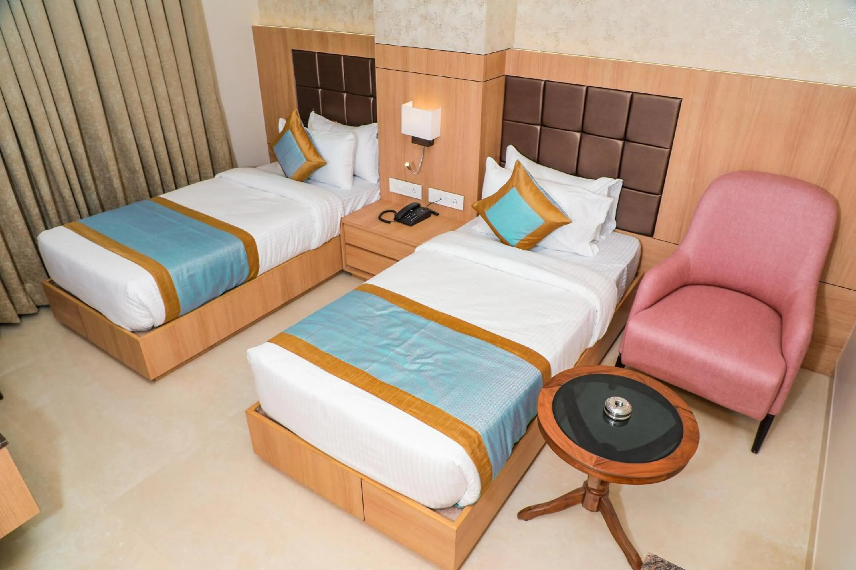 Bed in The Elegance Hotel