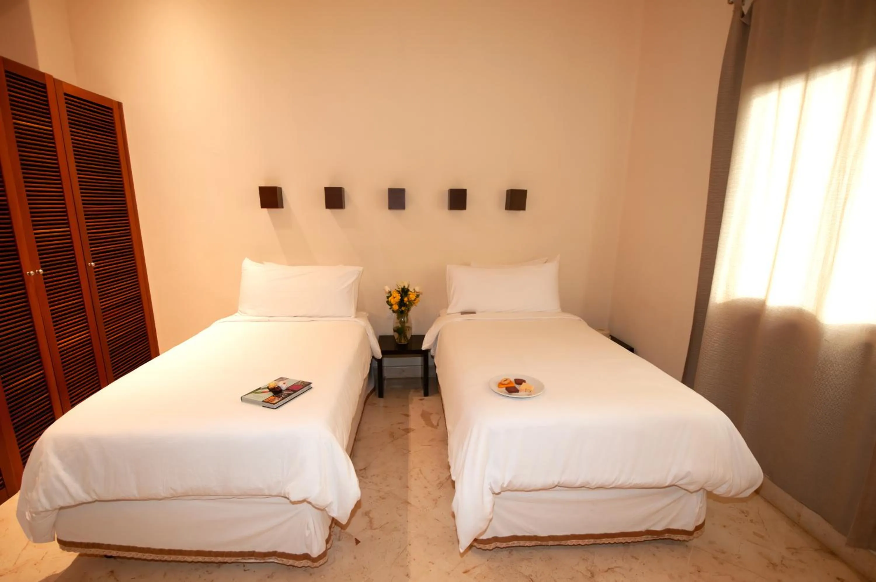 Bed in Porto Playa Condo Hotel and Beach Club