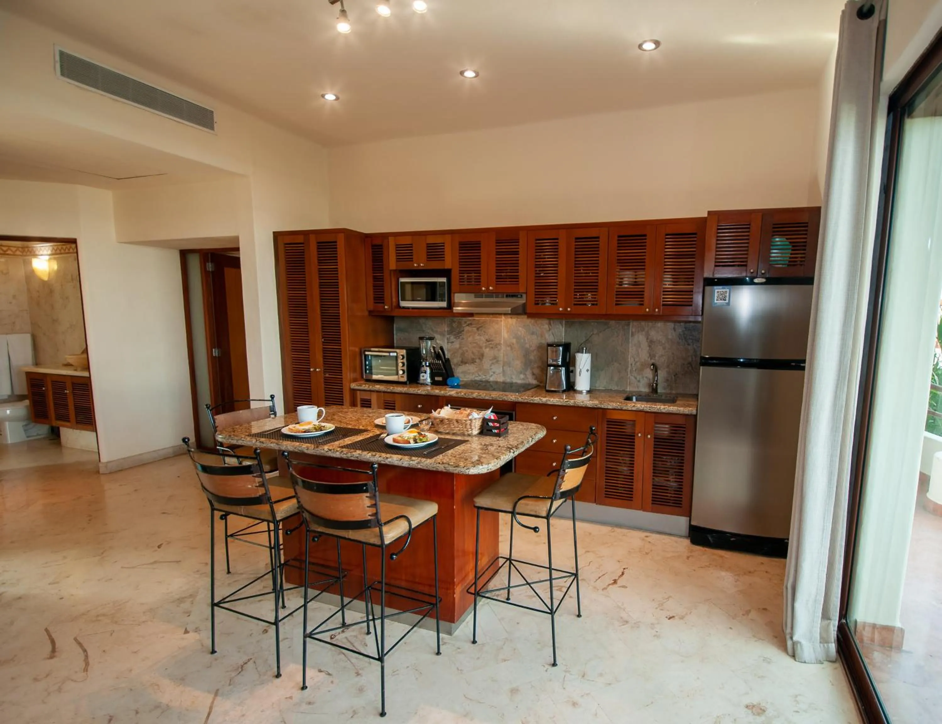 Dining area in Porto Playa Condo Hotel and Beach Club