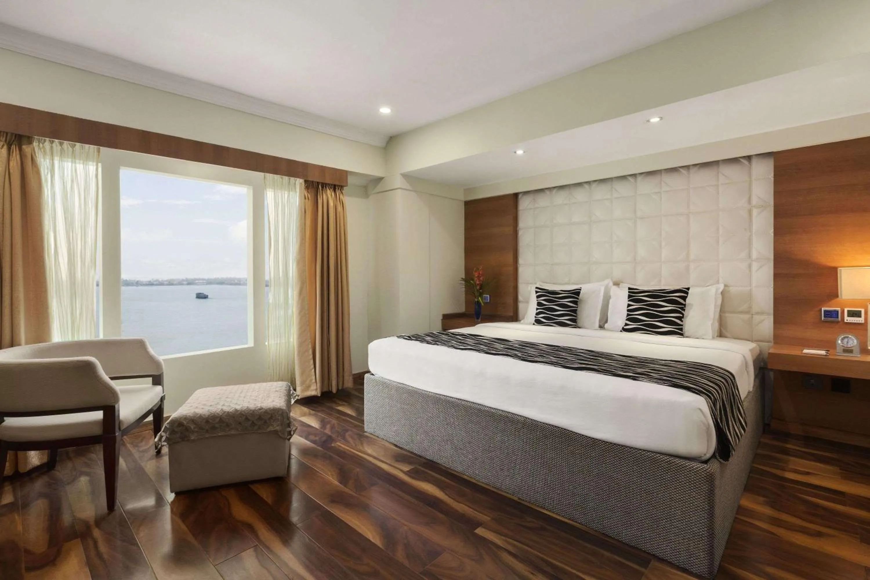 Photo of the whole room, Bed in Ramada by Wyndham Alleppey