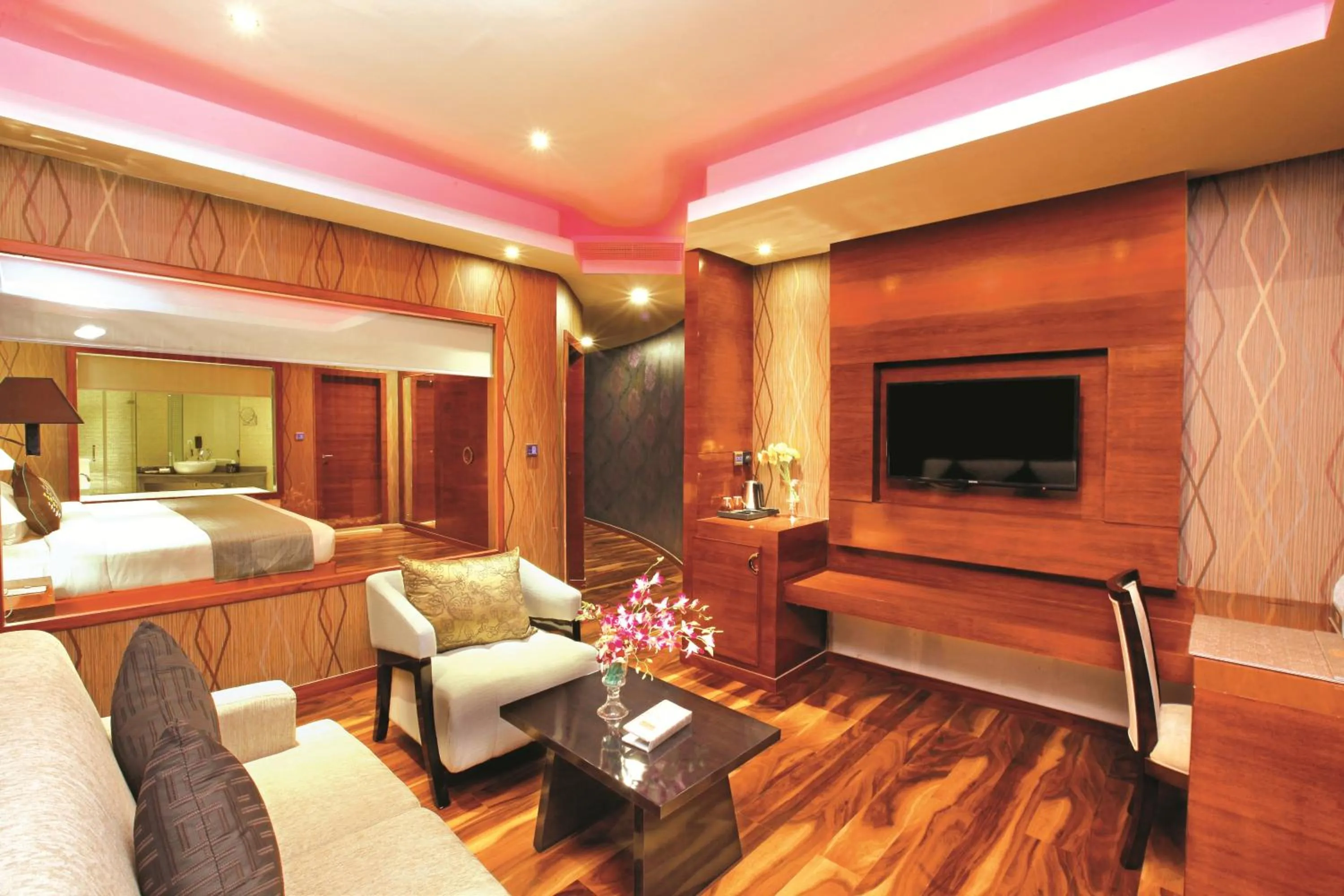 Living room, Bed in Ramada by Wyndham Alleppey