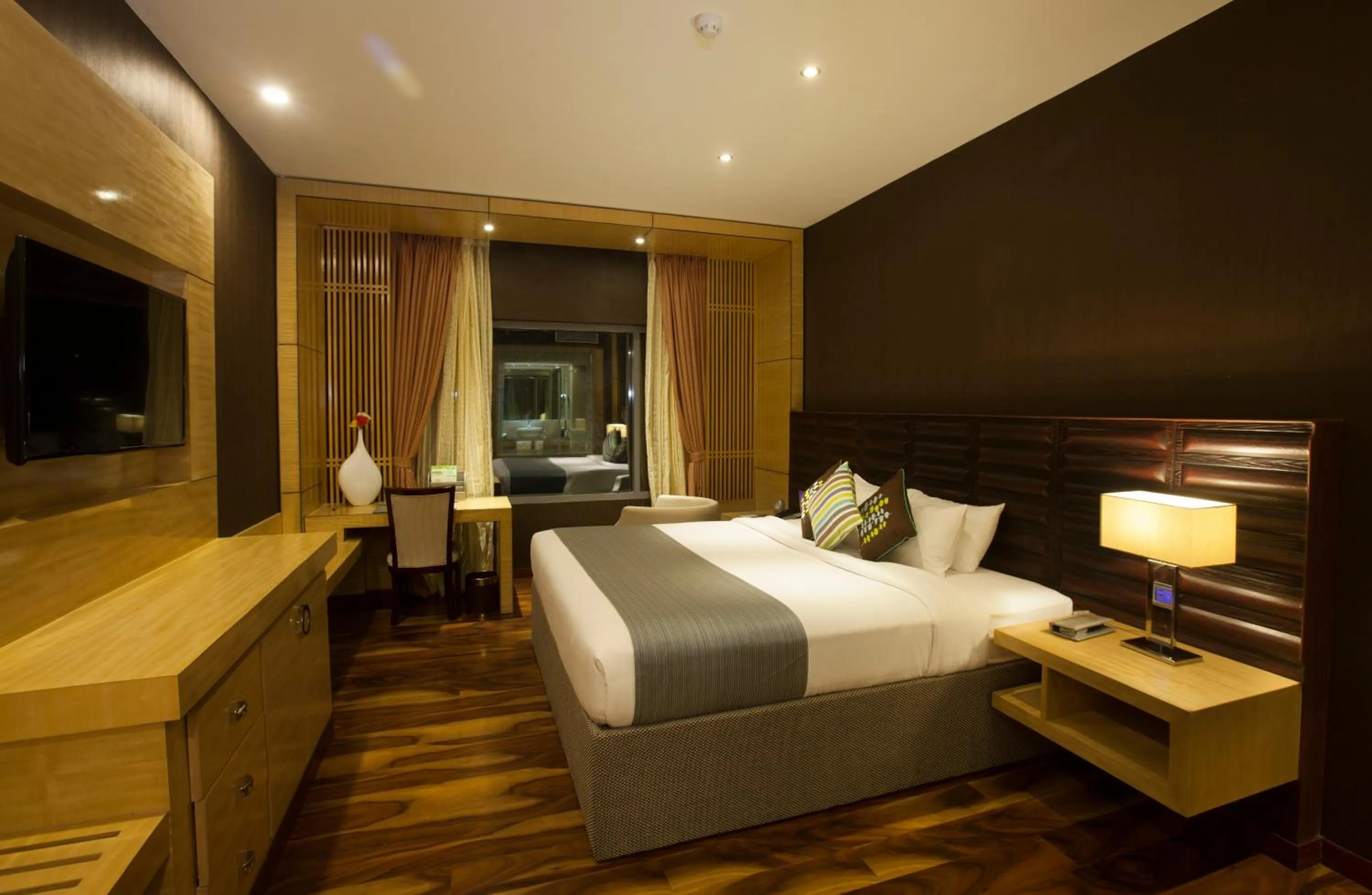 Bed in Ramada by Wyndham Alleppey