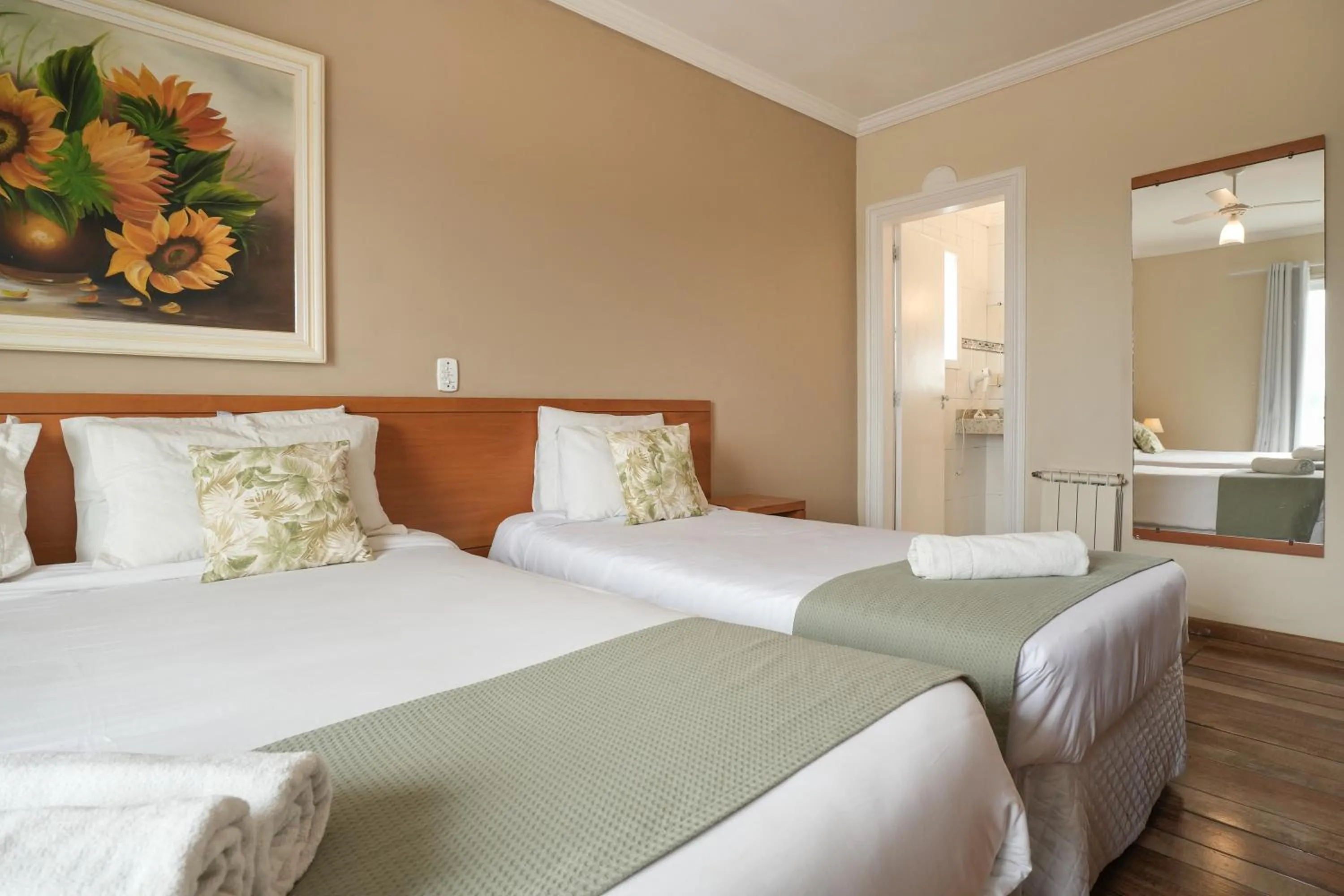 Bed in Pousada Parque das Flores