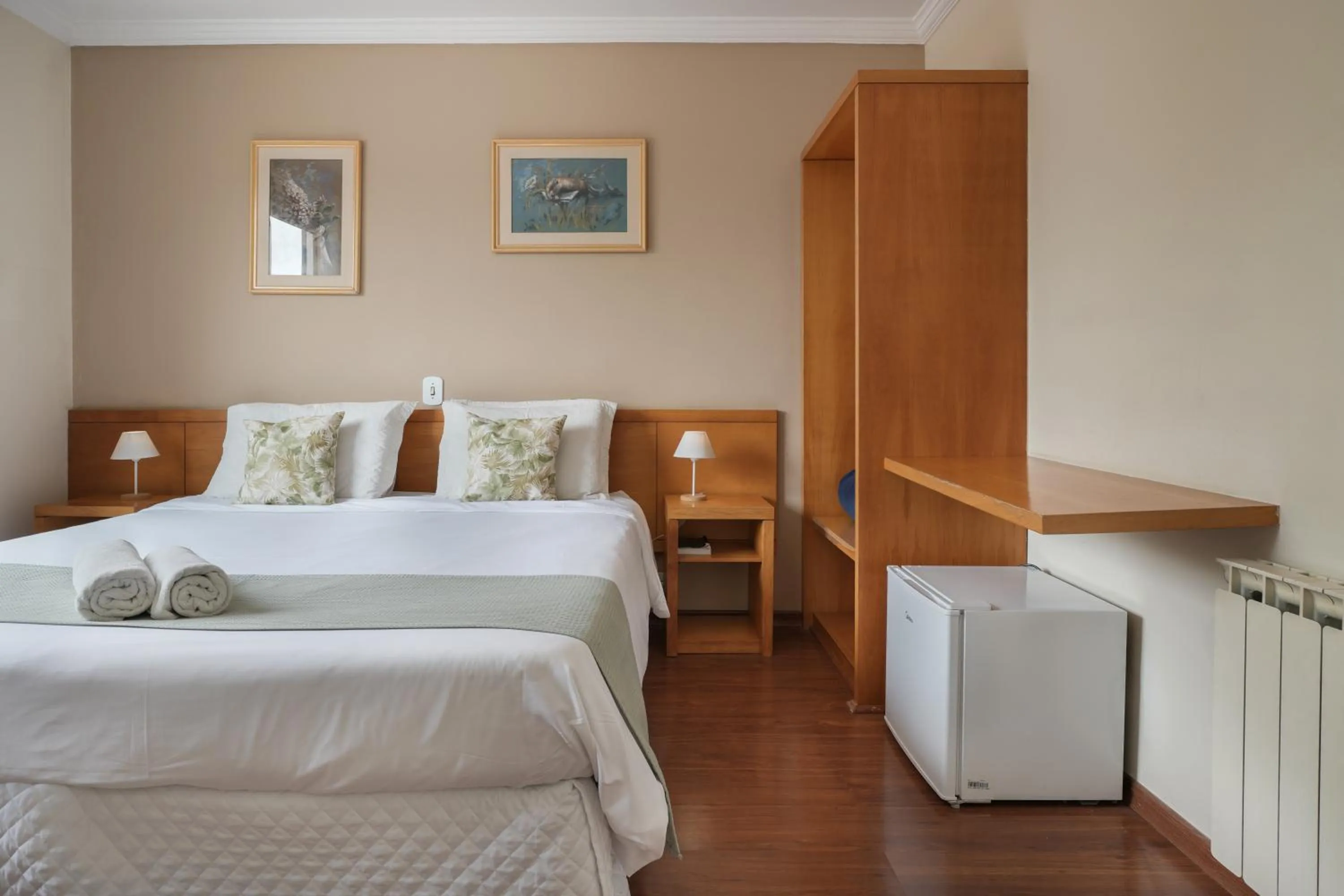 Bed in Pousada Parque das Flores