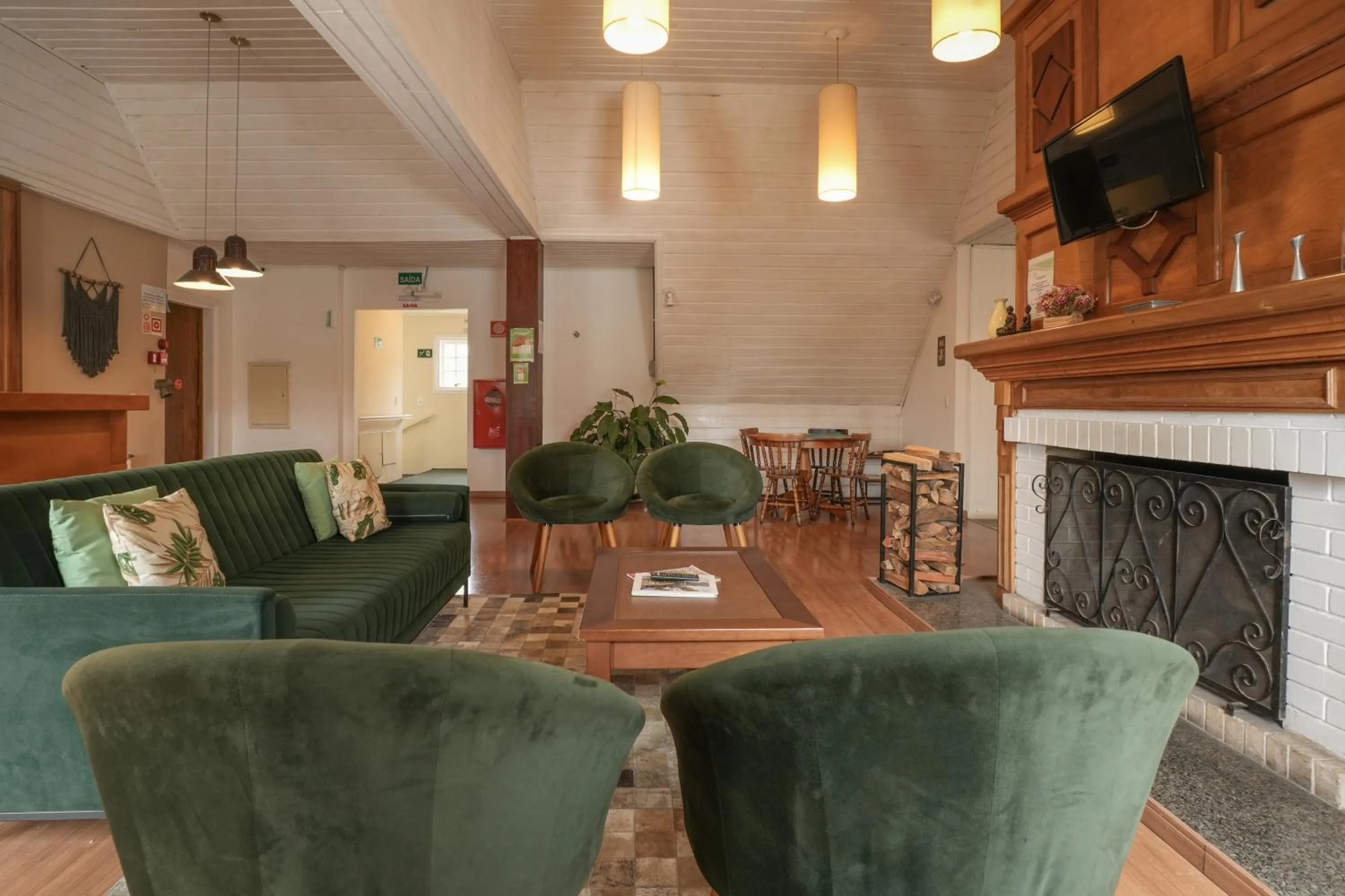 Living room in Pousada Parque das Flores