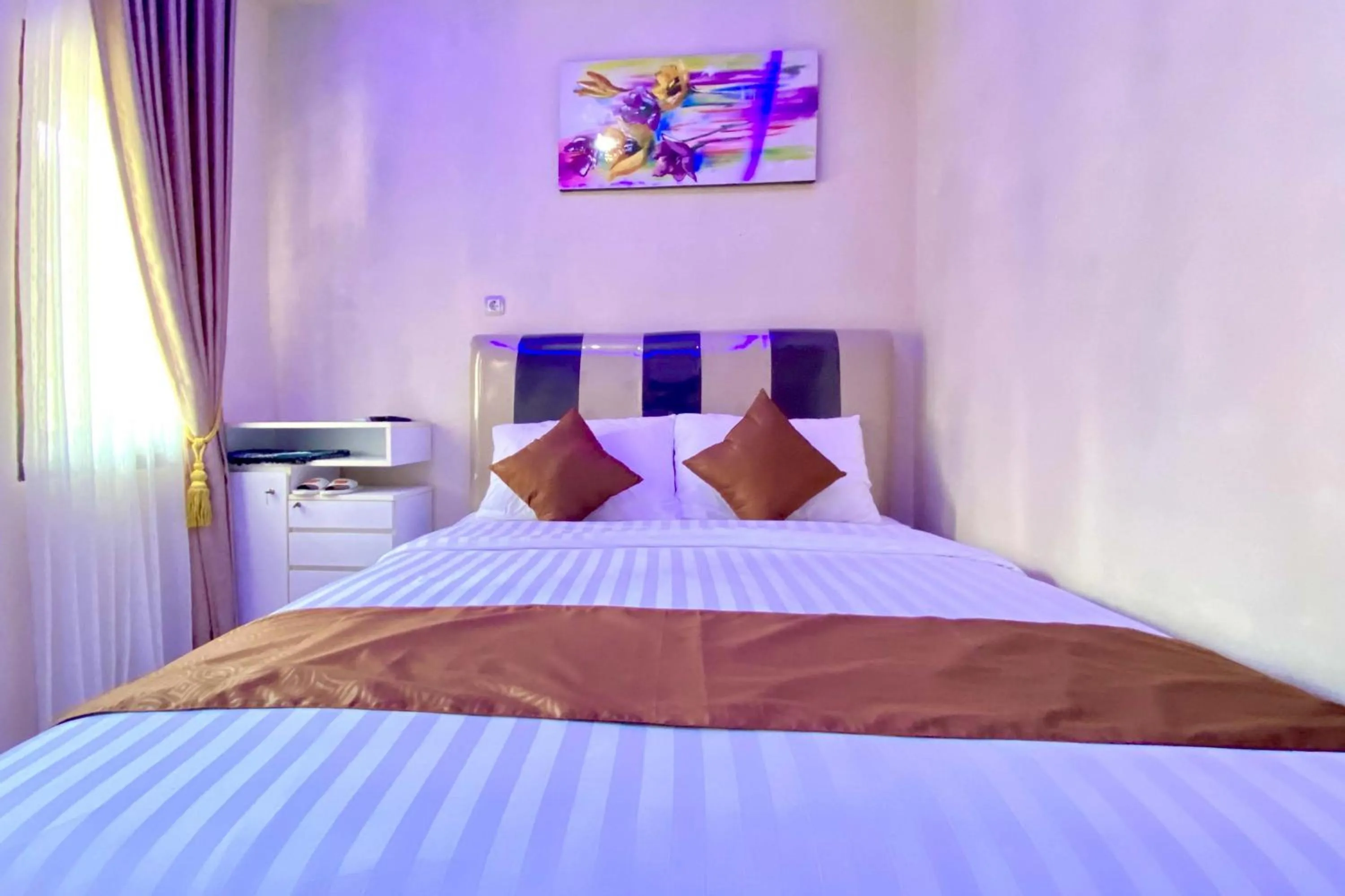 Bed in Homestay Banteng Adventure Dieng Mitra RedDoorz