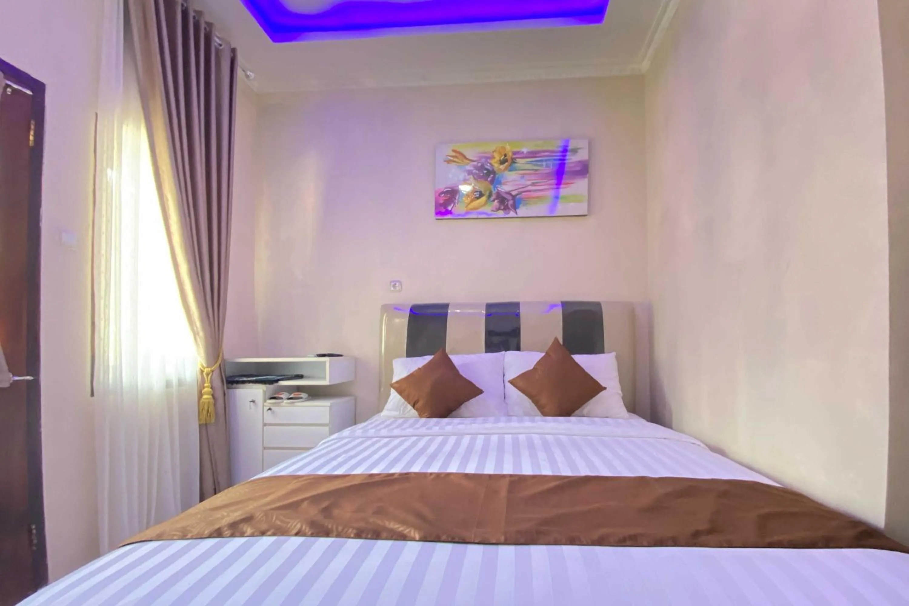 Bed in Homestay Banteng Adventure Dieng Mitra RedDoorz