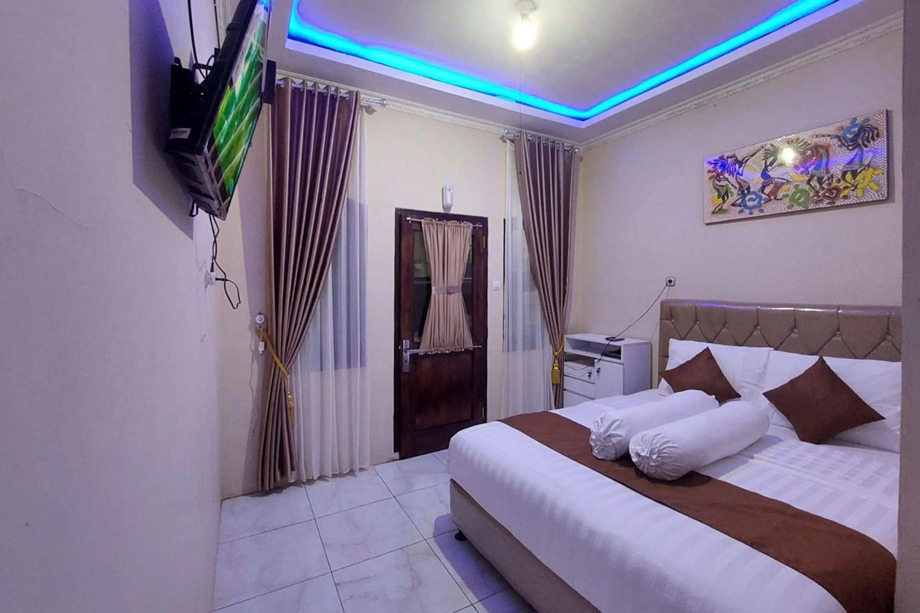 Bed in Homestay Banteng Adventure Dieng Mitra RedDoorz