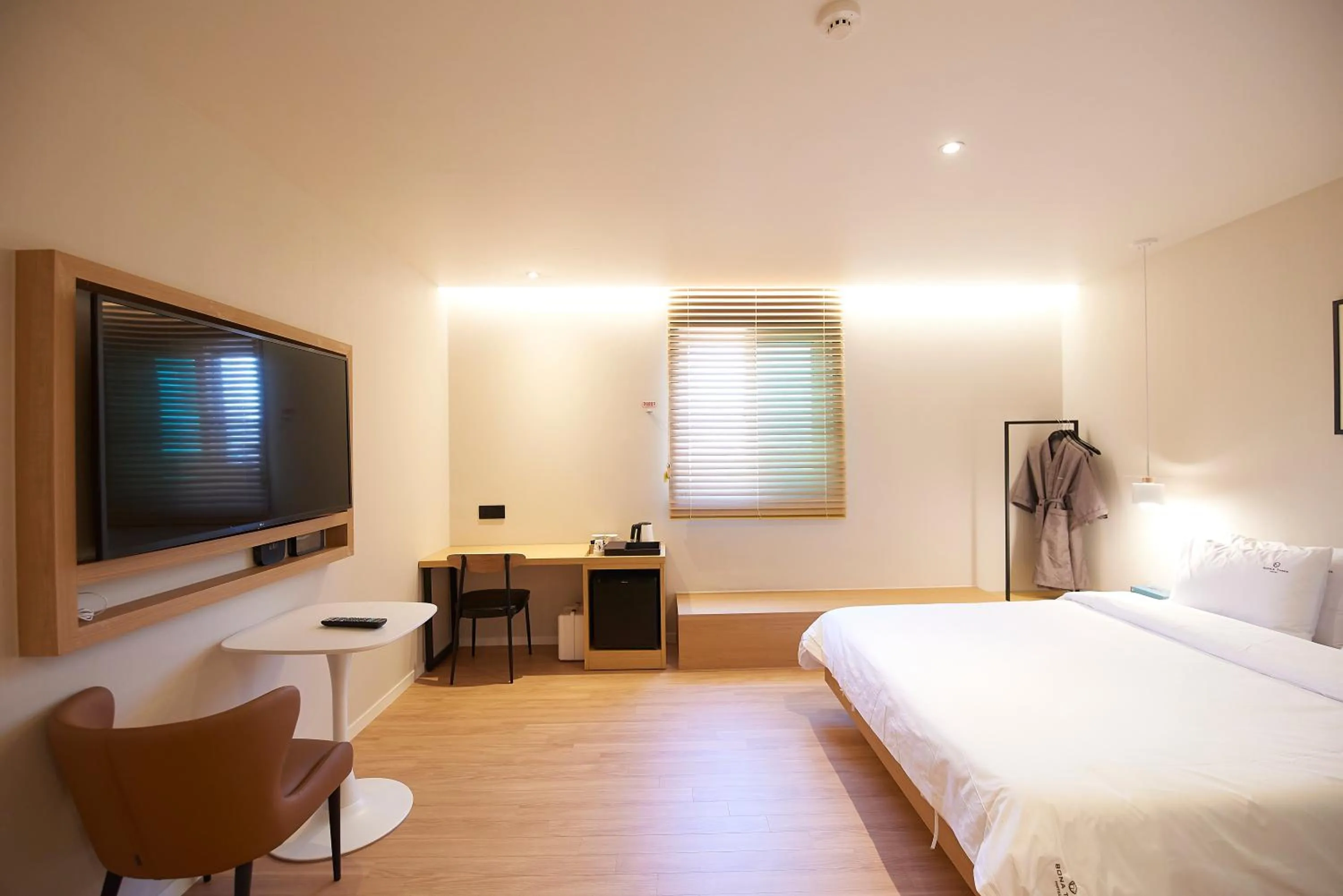 Bed in BONATHREE HOTEL