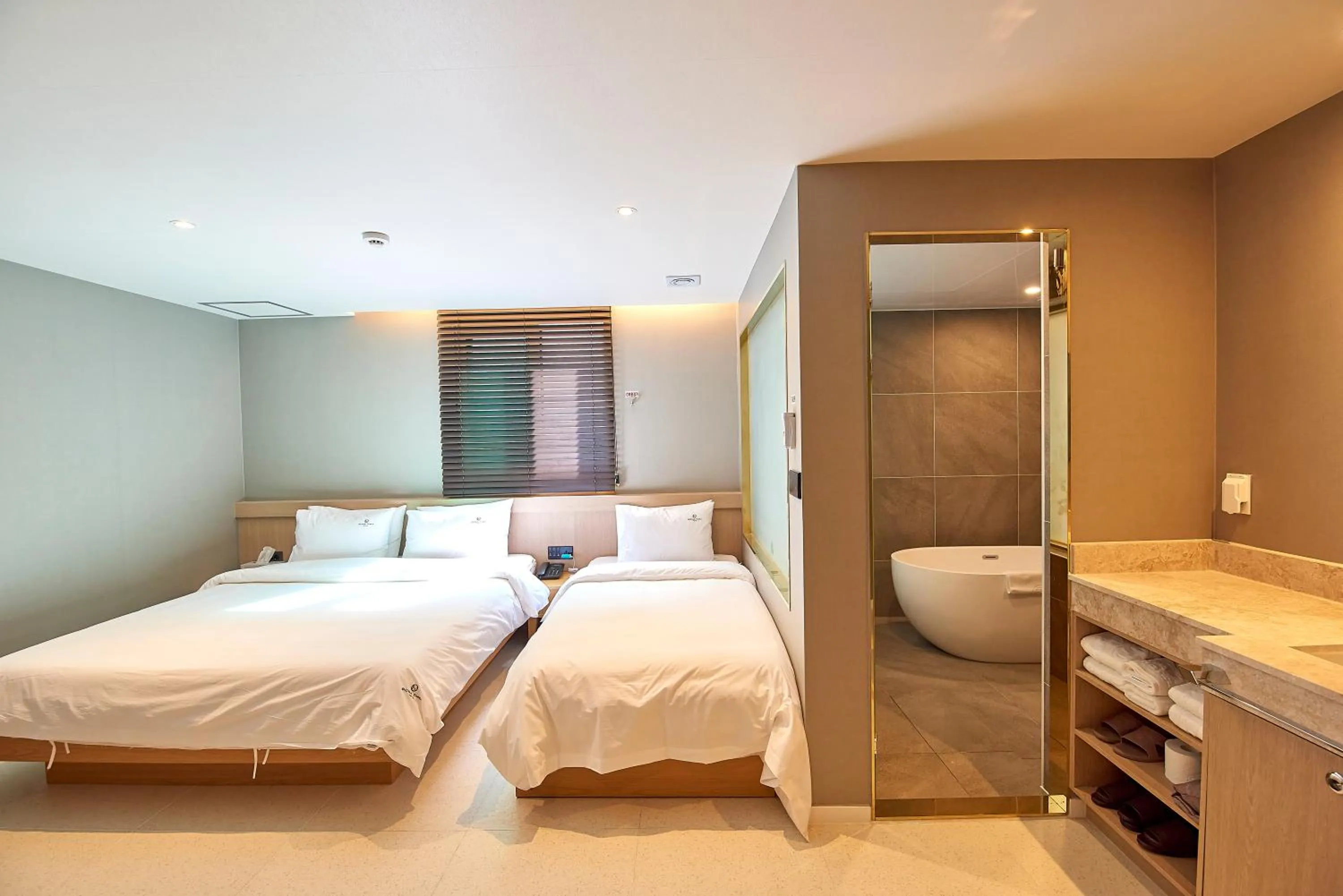 Bed in BONATHREE HOTEL