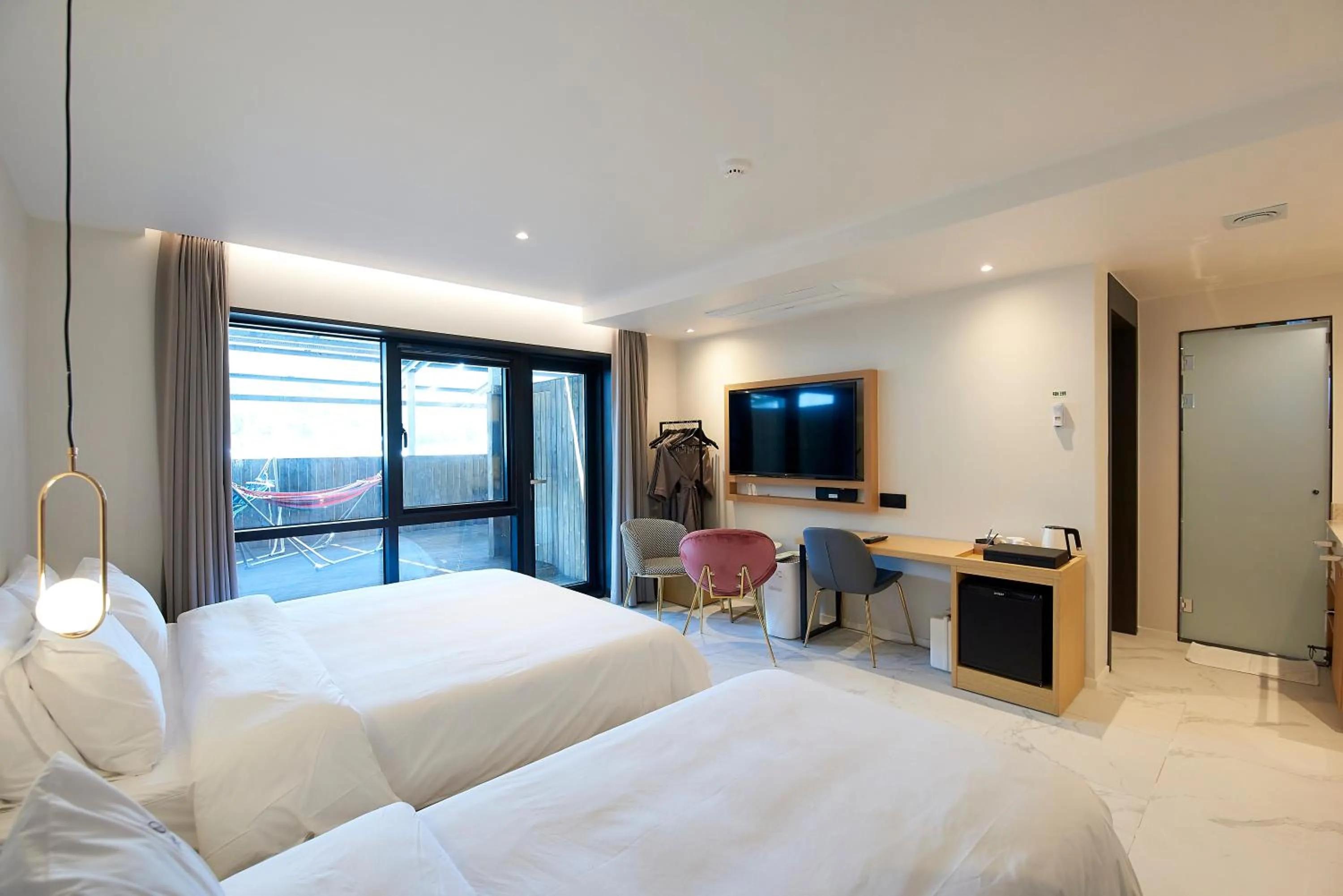 Bed in BONATHREE HOTEL