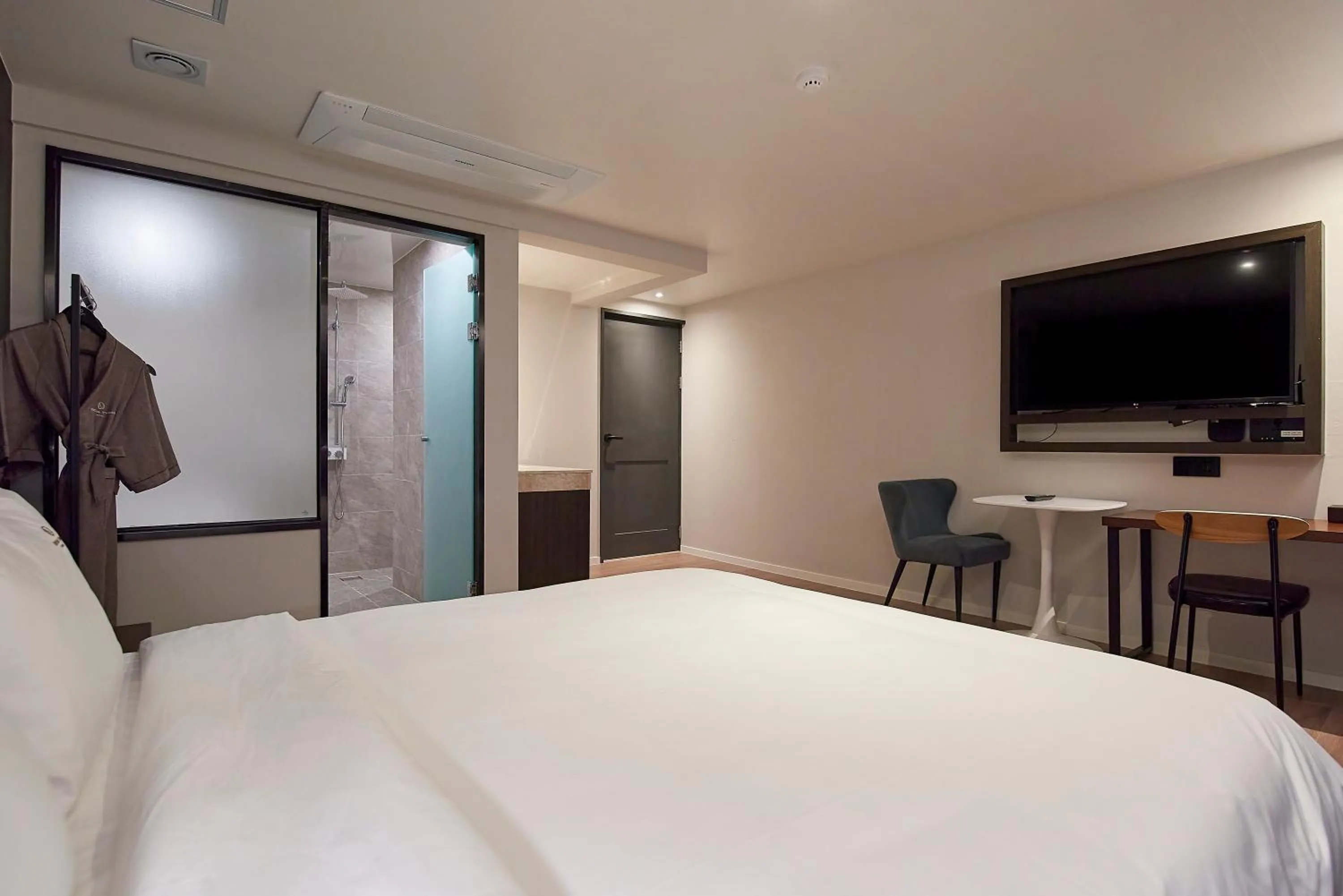 Bed in BONATHREE HOTEL